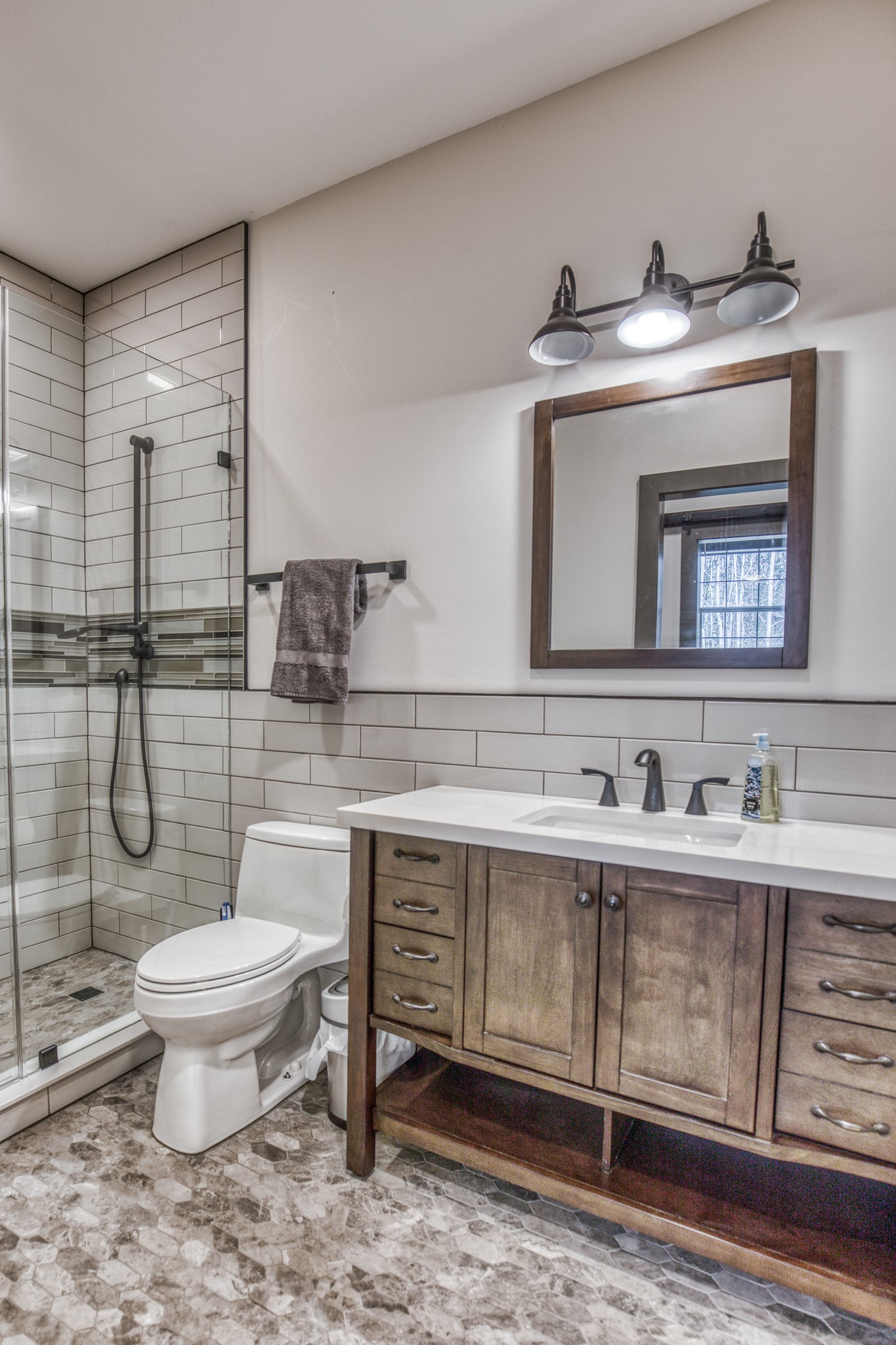 5280 Whitaker Way Navasota, TX 77868 - Photo 13 of 21 a bathroom with a toilet sink and mirror
