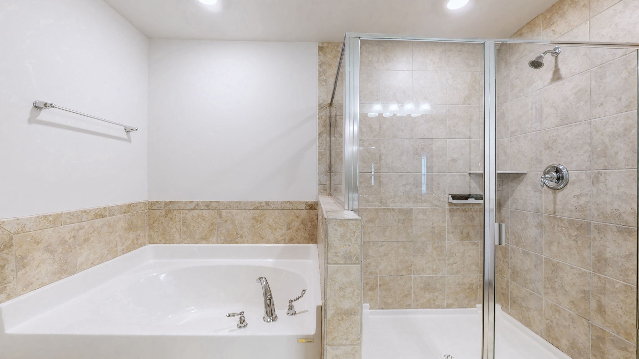 4235 Grapevine Loop Smyrna, TN 37167 - Photo 15 of 44 a bathroom with a bathtub and a shower
