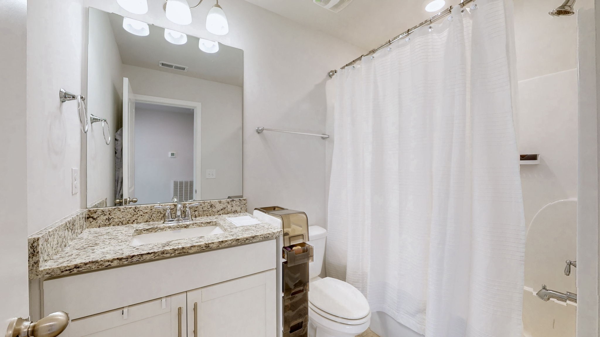 4235 Grapevine Loop Smyrna, TN 37167 - Photo 19 of 44 a bathroom with a granite countertop sink vanity mirror and toilet