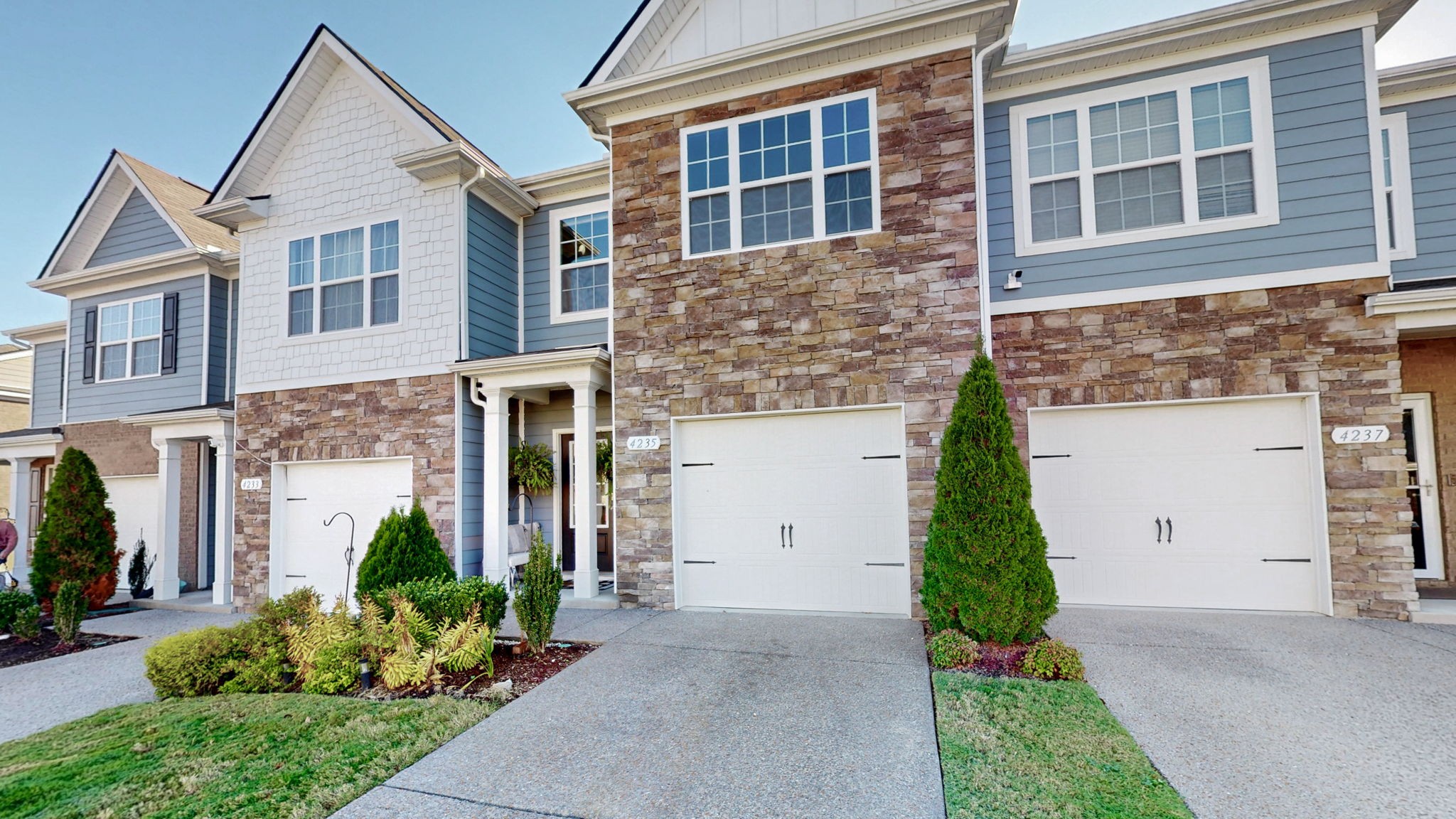 4235 Grapevine Loop Smyrna, TN 37167 - Photo 23 of 44 a front view of a house with a yard and garage