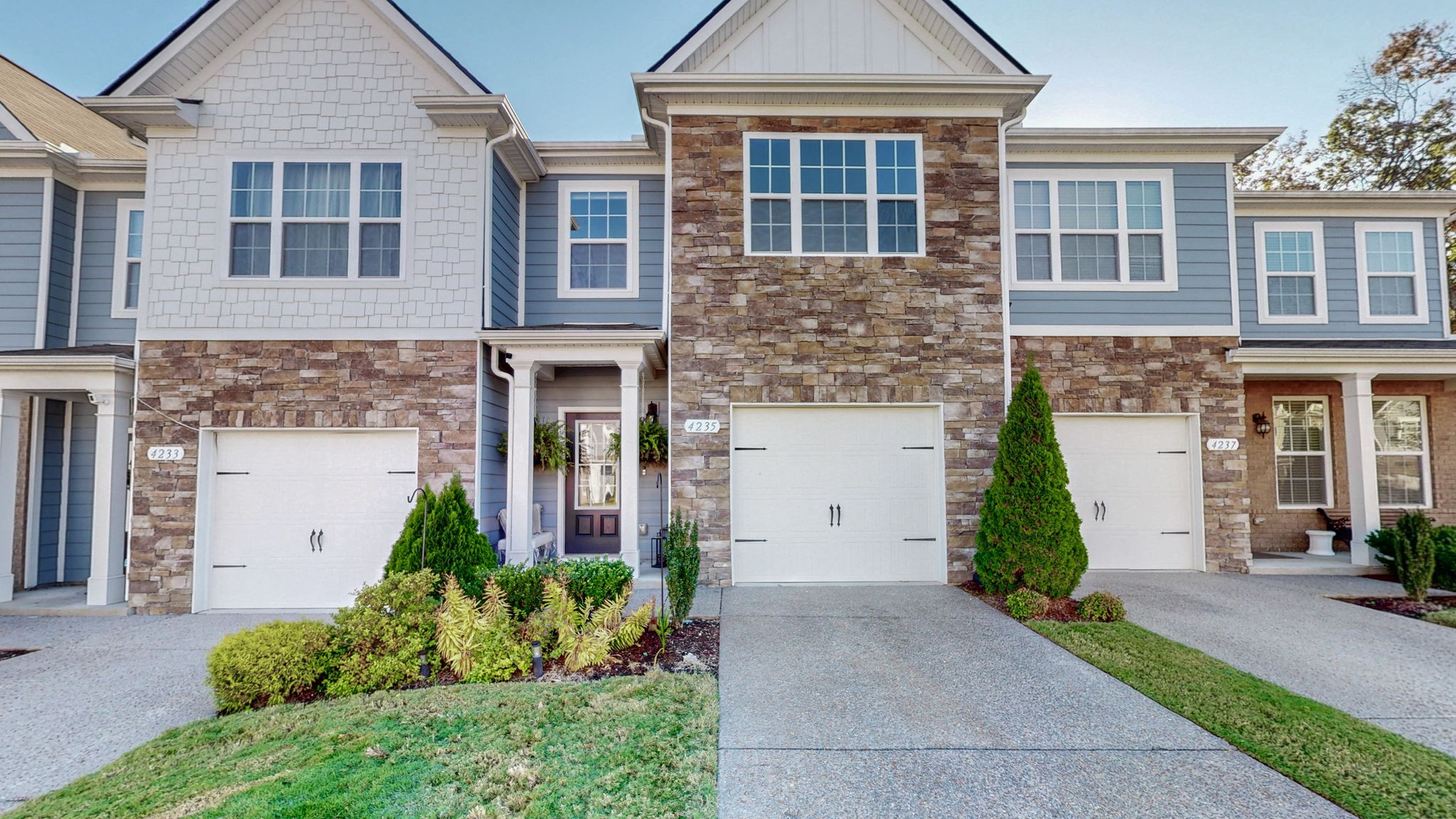 4235 Grapevine Loop Smyrna, TN 37167 - Photo 24 of 44 front view of a brick house with a yard