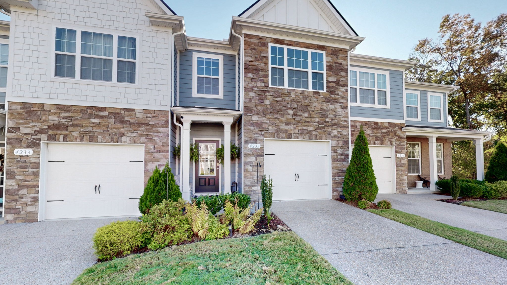 4235 Grapevine Loop Smyrna, TN 37167 - Photo 25 of 44 a front view of a house with garden