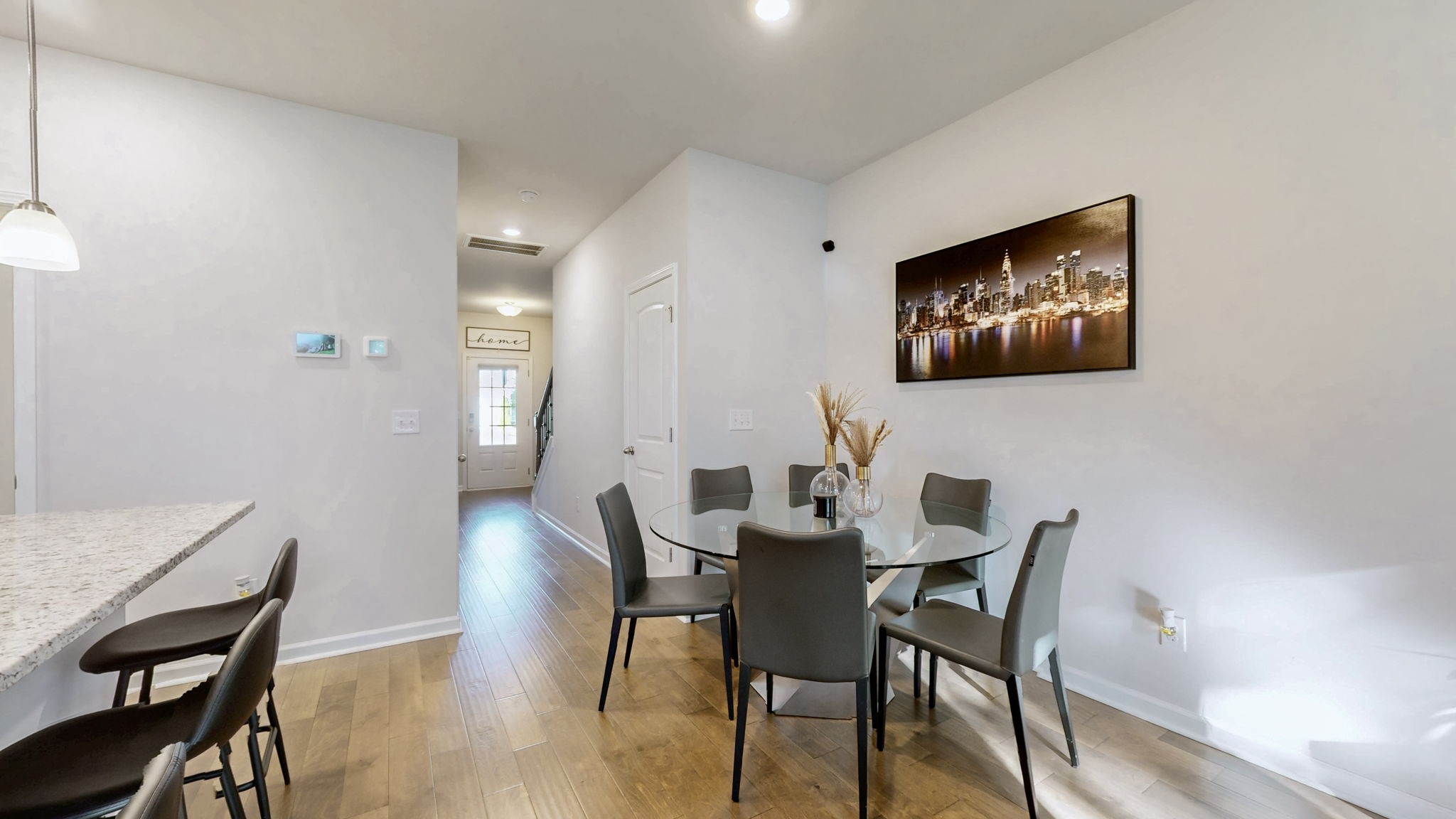 4235 Grapevine Loop Smyrna, TN 37167 - Photo 8 of 44 a view of a dining room with furniture and wooden floor