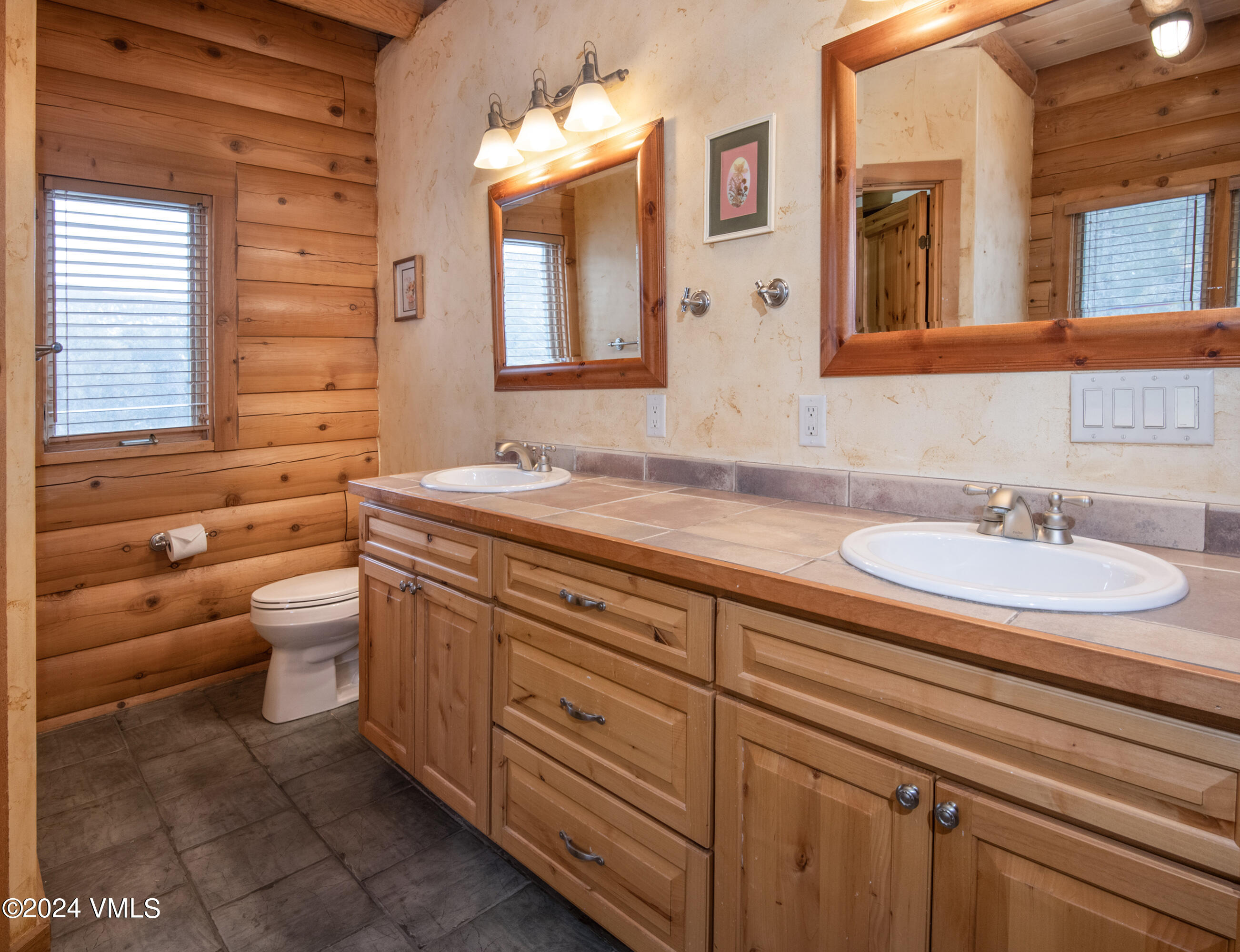 336 Castle Peak Road Eagle, CO 81631 - Photo 13 of 52 a bathroom with a granite countertop sink mirror and a
