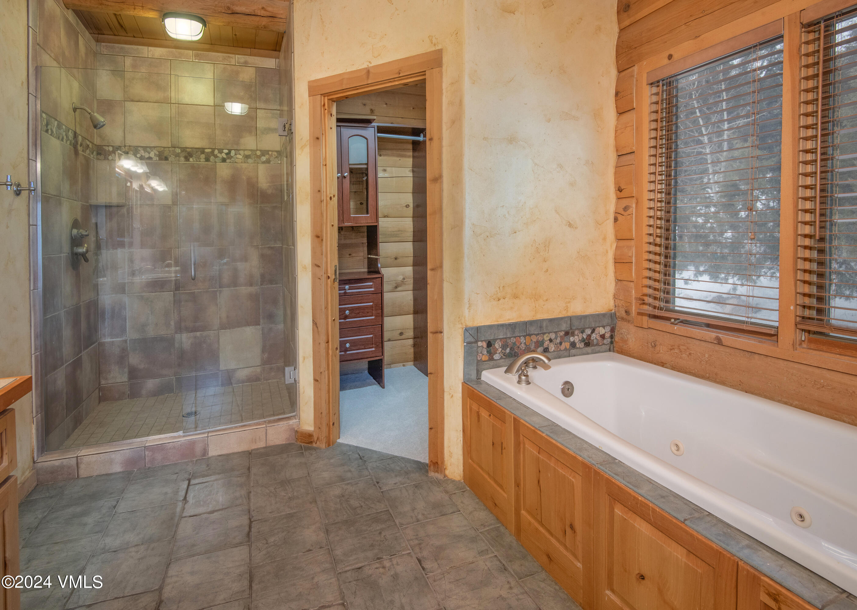 336 Castle Peak Road Eagle, CO 81631 - Photo 14 of 52 a bathroom with a bathtub and shower