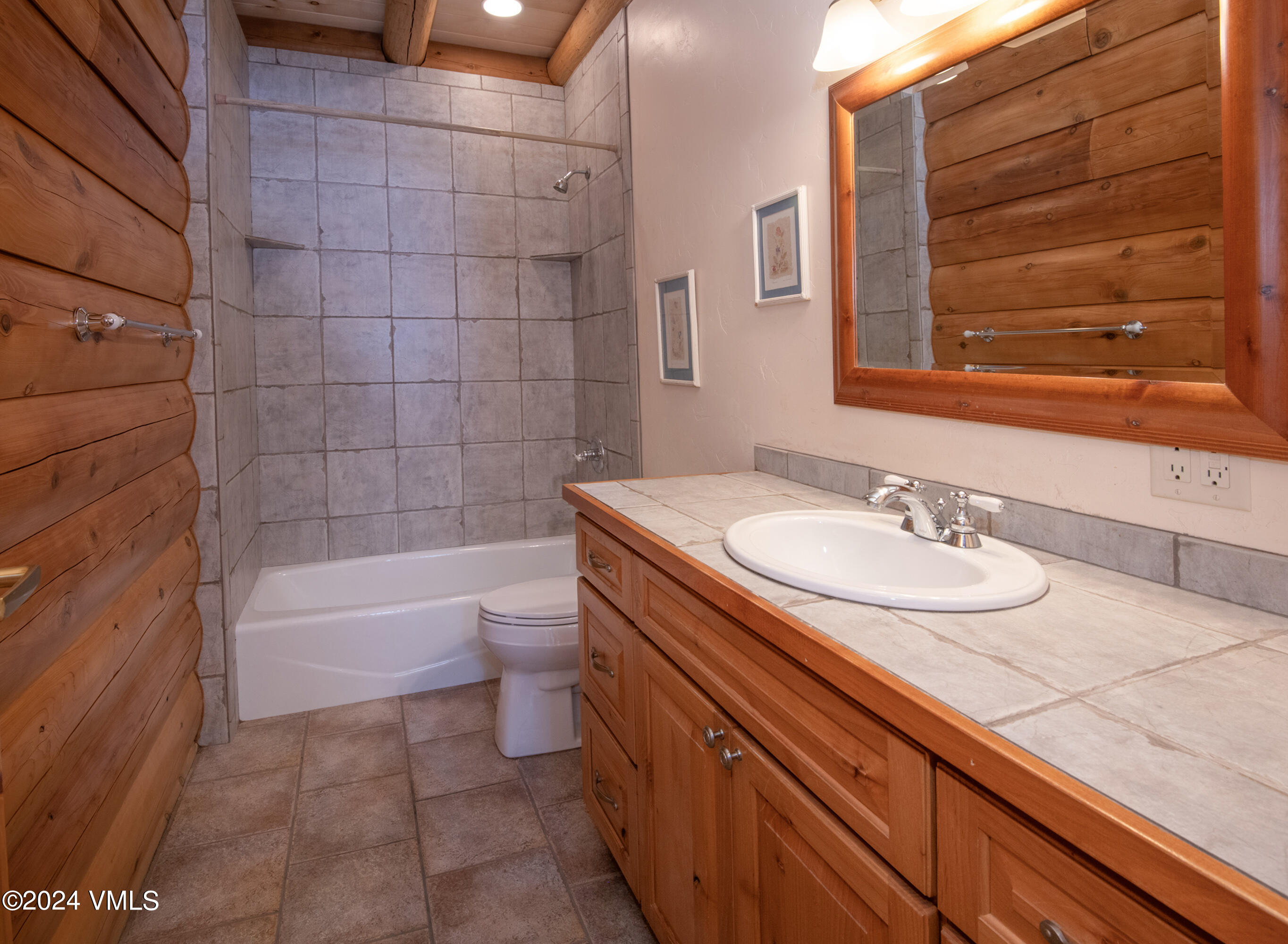 336 Castle Peak Road Eagle, CO 81631 - Photo 16 of 52 a bathroom with a granite countertop sink and a bathtub