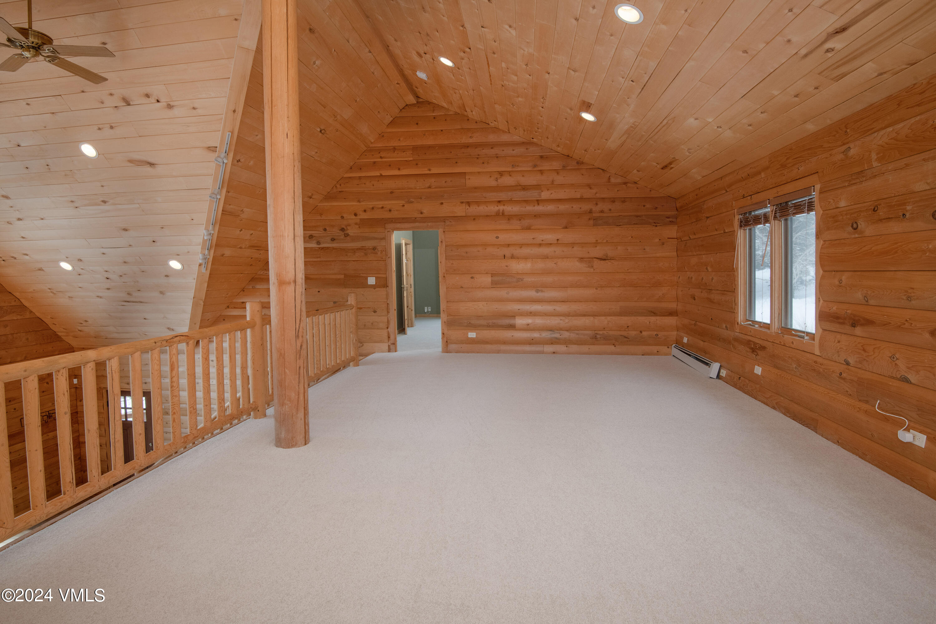 336 Castle Peak Road Eagle, CO 81631 - Photo 18 of 52 a view of an empty room with a window