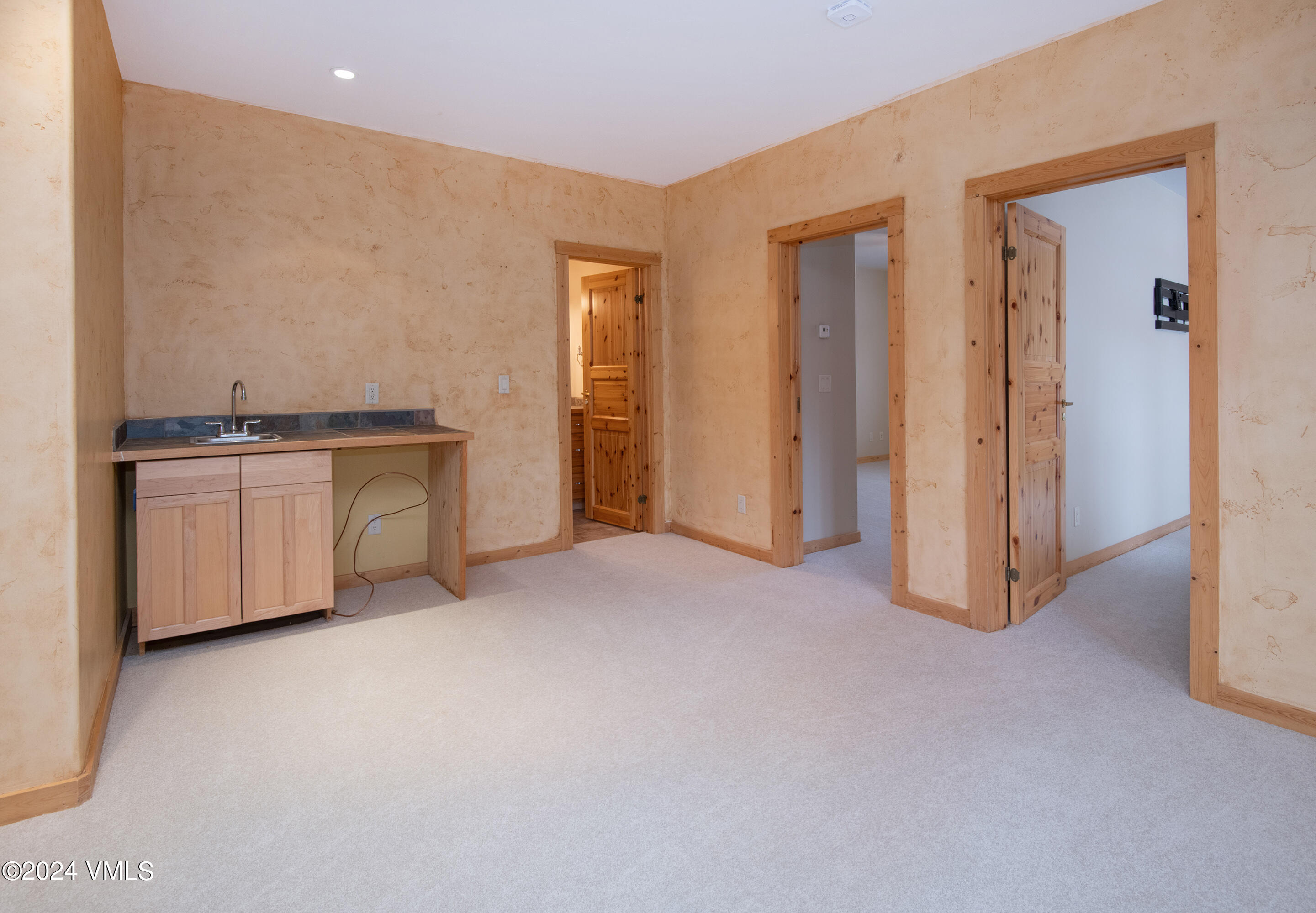 336 Castle Peak Road Eagle, CO 81631 - Photo 23 of 52 a view of a kitchen with stainless steel appliances granite countertop a stove and a refrigerator