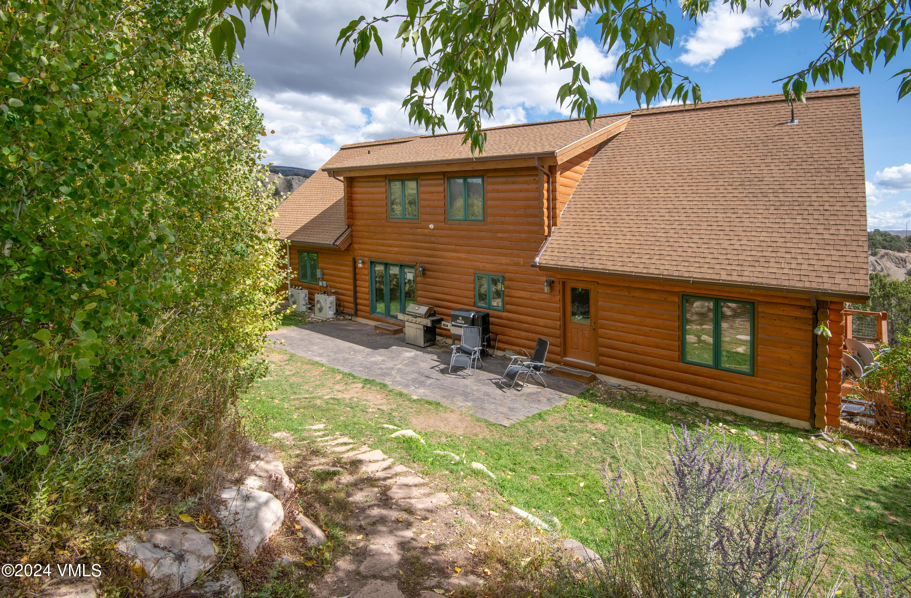336 Castle Peak Road Eagle, CO 81631 - Photo 42 of 52 front view of a house with yard
