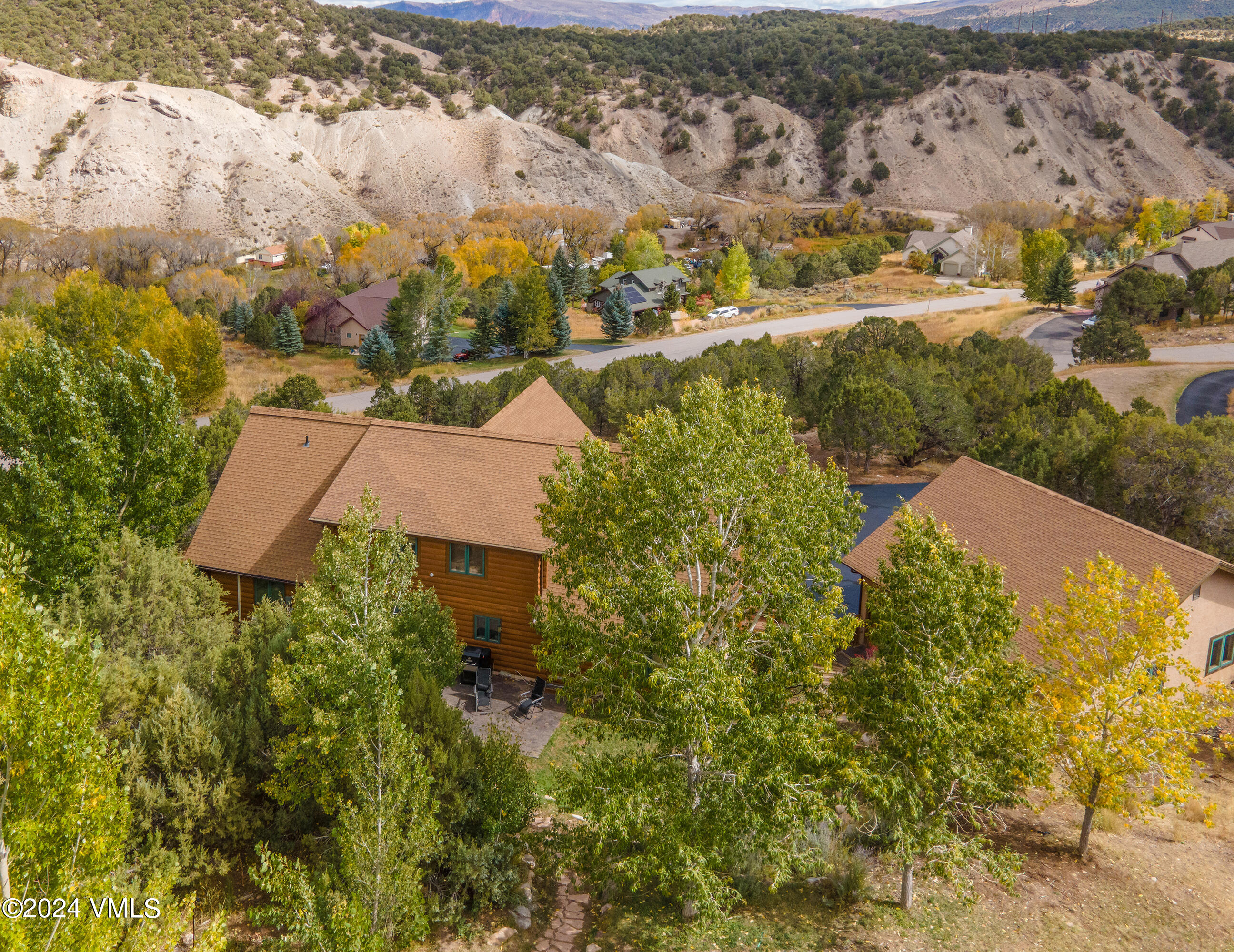 336 Castle Peak Road Eagle, CO 81631 - Photo 46 of 52 an aerial view of residential houses with outdoor space and trees