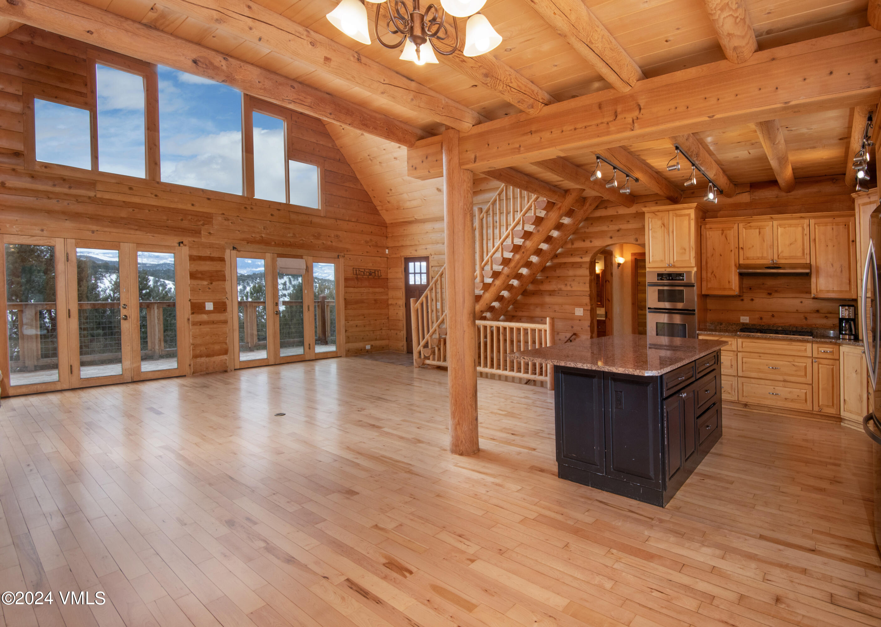 336 Castle Peak Road Eagle, CO 81631 - Photo 5 of 52 a view of a porch with wooden floor