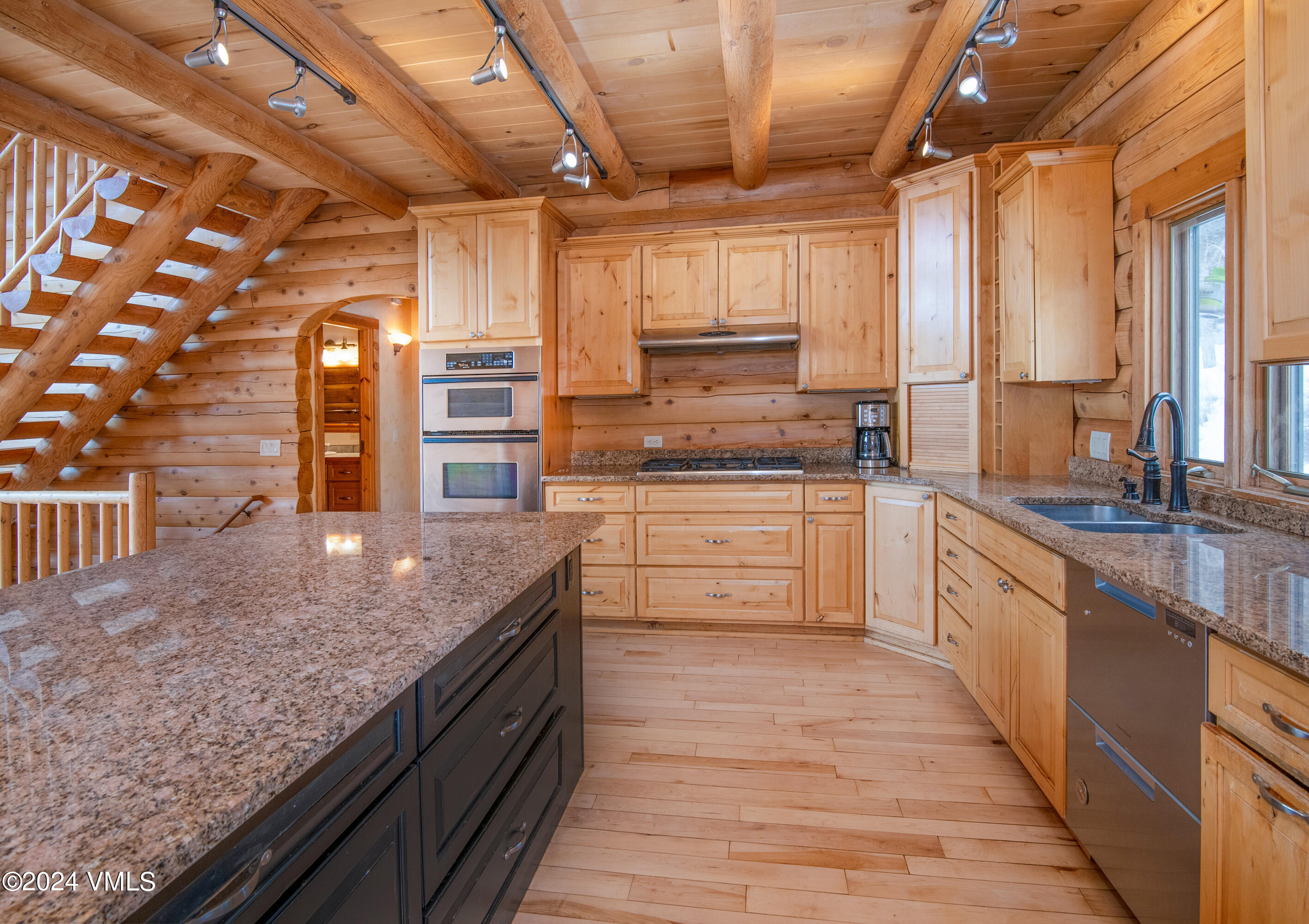 336 Castle Peak Road Eagle, CO 81631 - Photo 6 of 52 a large kitchen with a counter space a sink and appliances