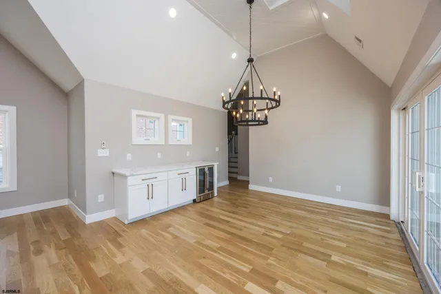 a bathroom with a sink vanity mirror and toilet