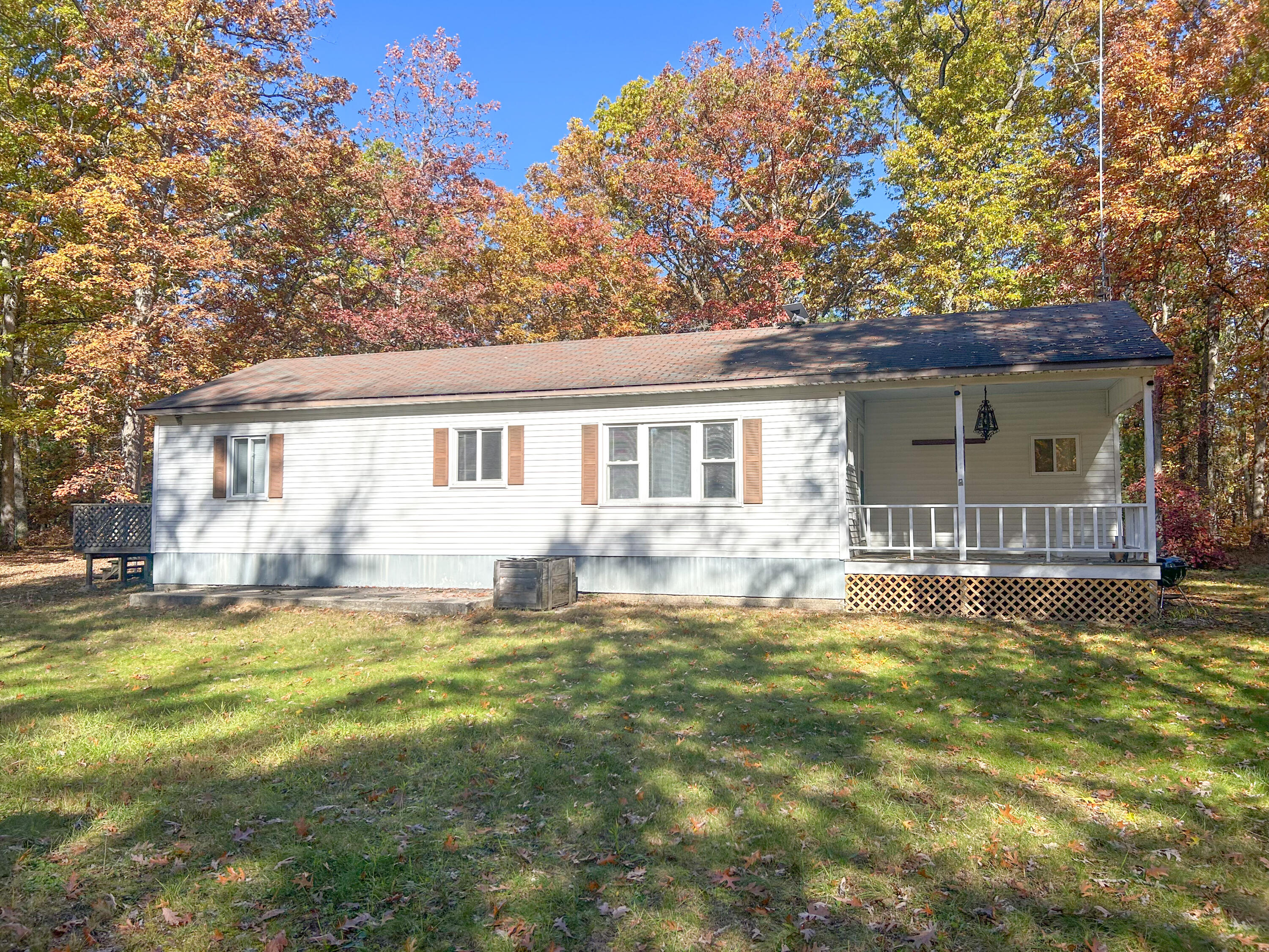 6970 West 8 Mile Road Irons, MI 49644 - Photo 2 of 23 Front Exterior