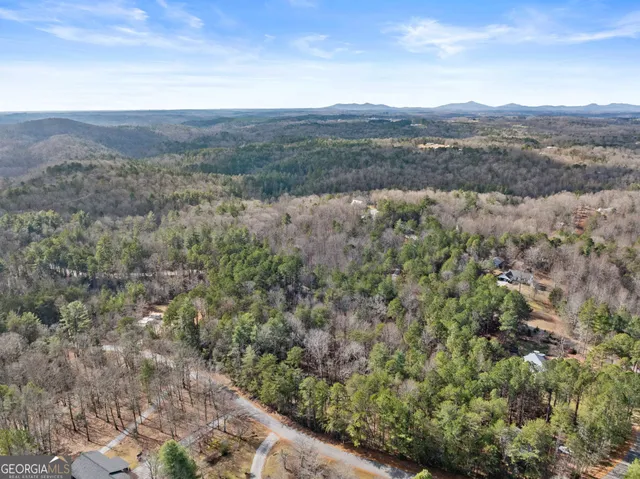 a view of mountain view with mountains in the background