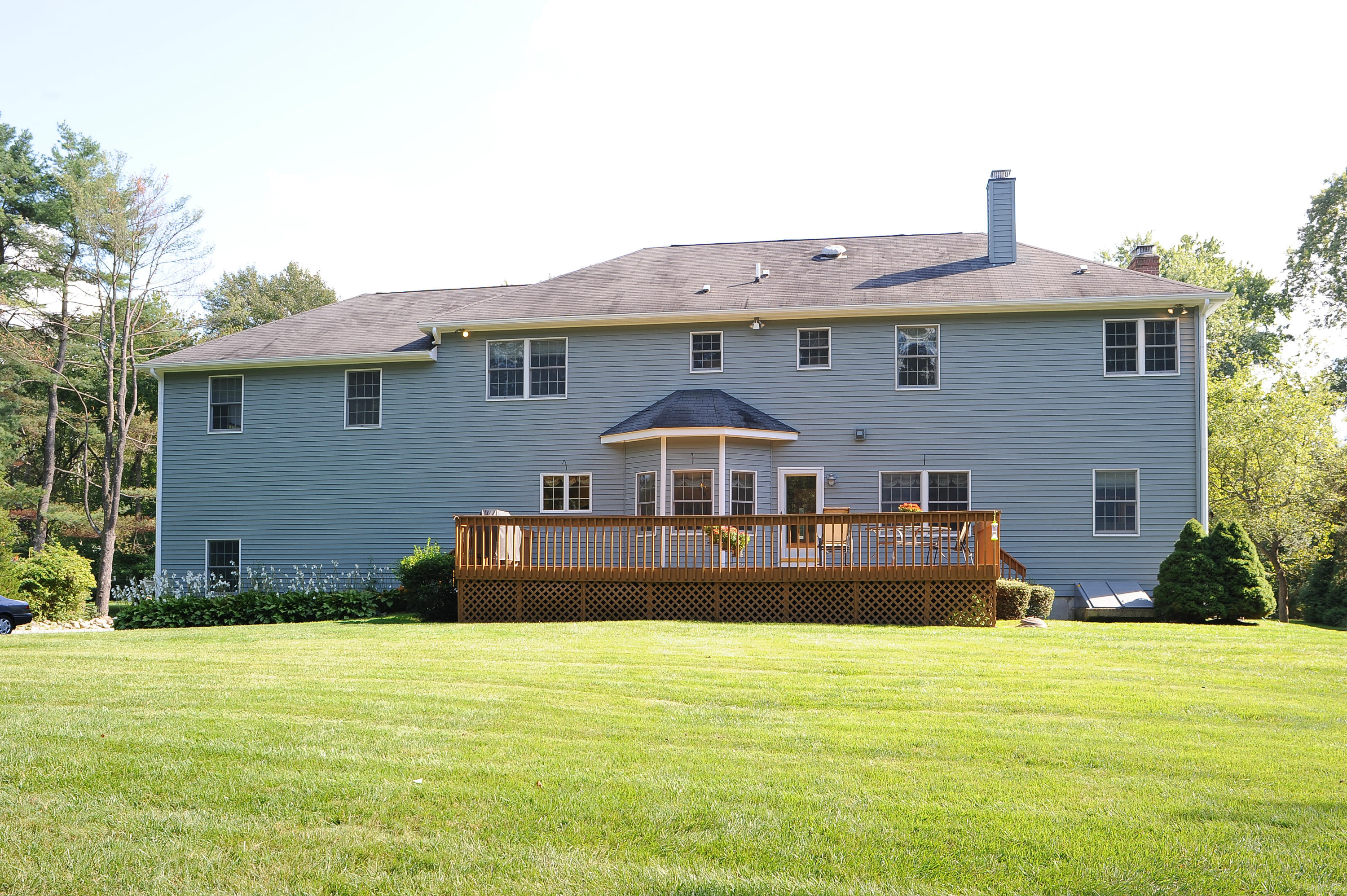 54 Conrad Road New Canaan, CT 06840 - Photo 21 of 21 a front view of a house with swimming pool