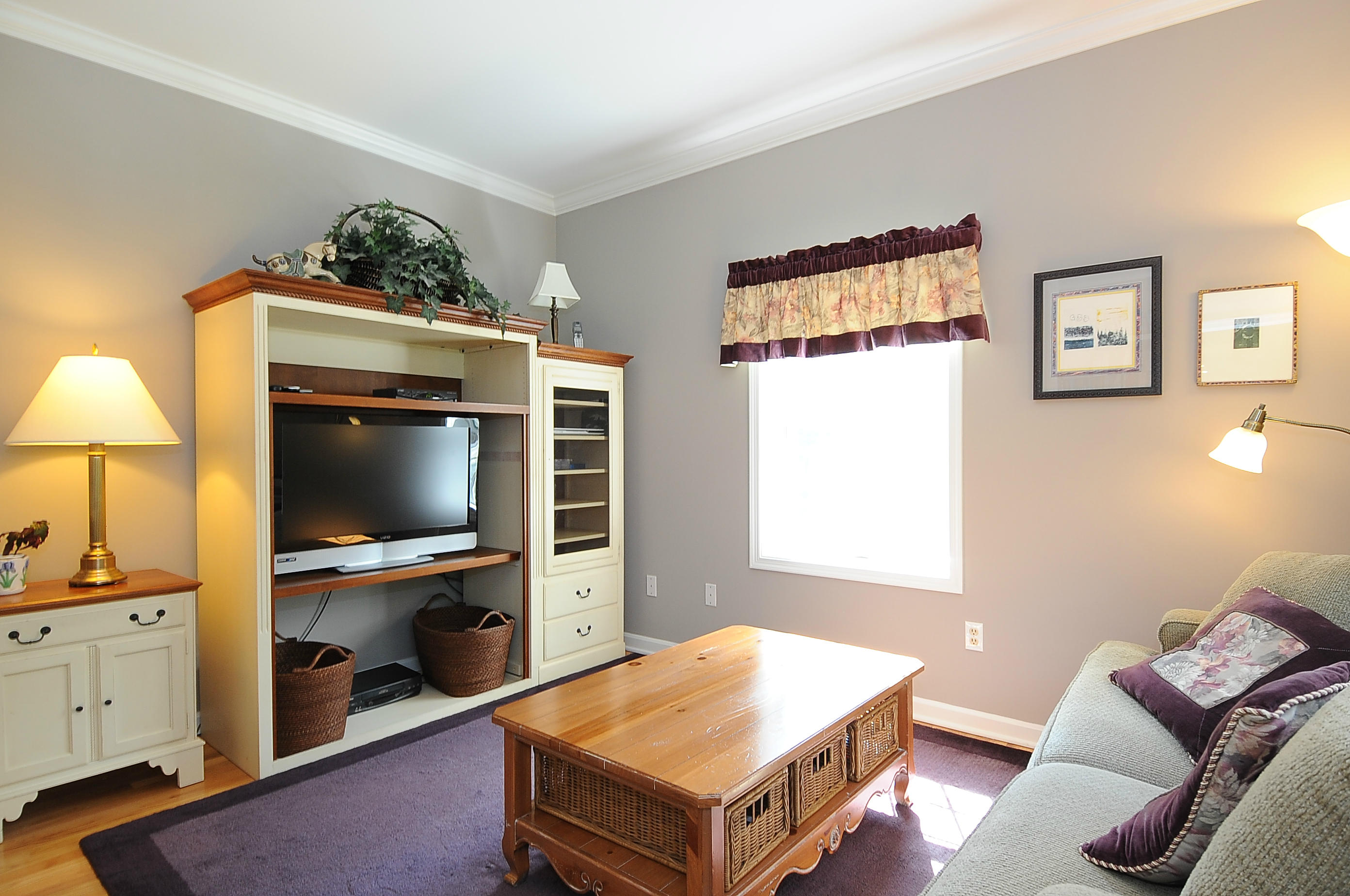 54 Conrad Road New Canaan, CT 06840 - Photo 10 of 21 a living room with furniture and a flat screen tv