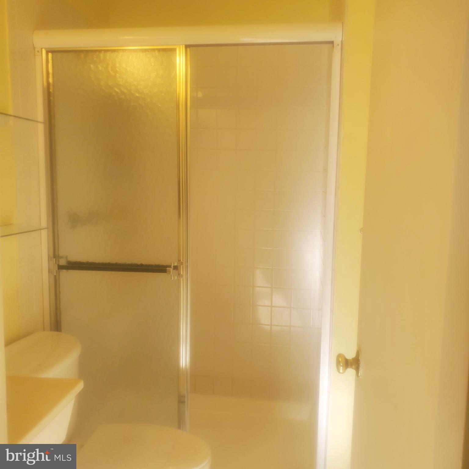 9202 Weathervane Place Montgomery Village, MD 20886 - Photo 20 of 71 a bathroom with a shower
