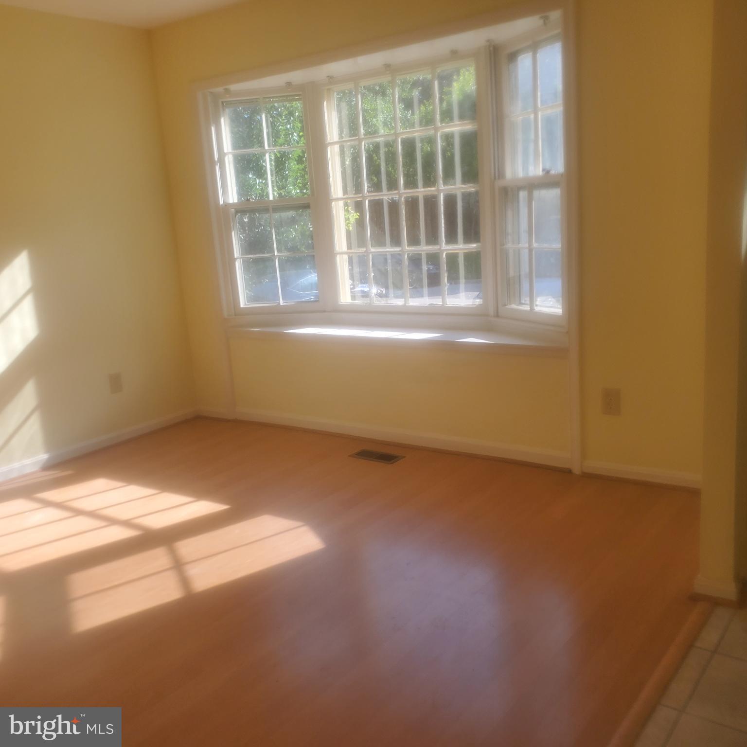 9202 Weathervane Place Montgomery Village, MD 20886 - Photo 22 of 71 a view of an empty room with a window