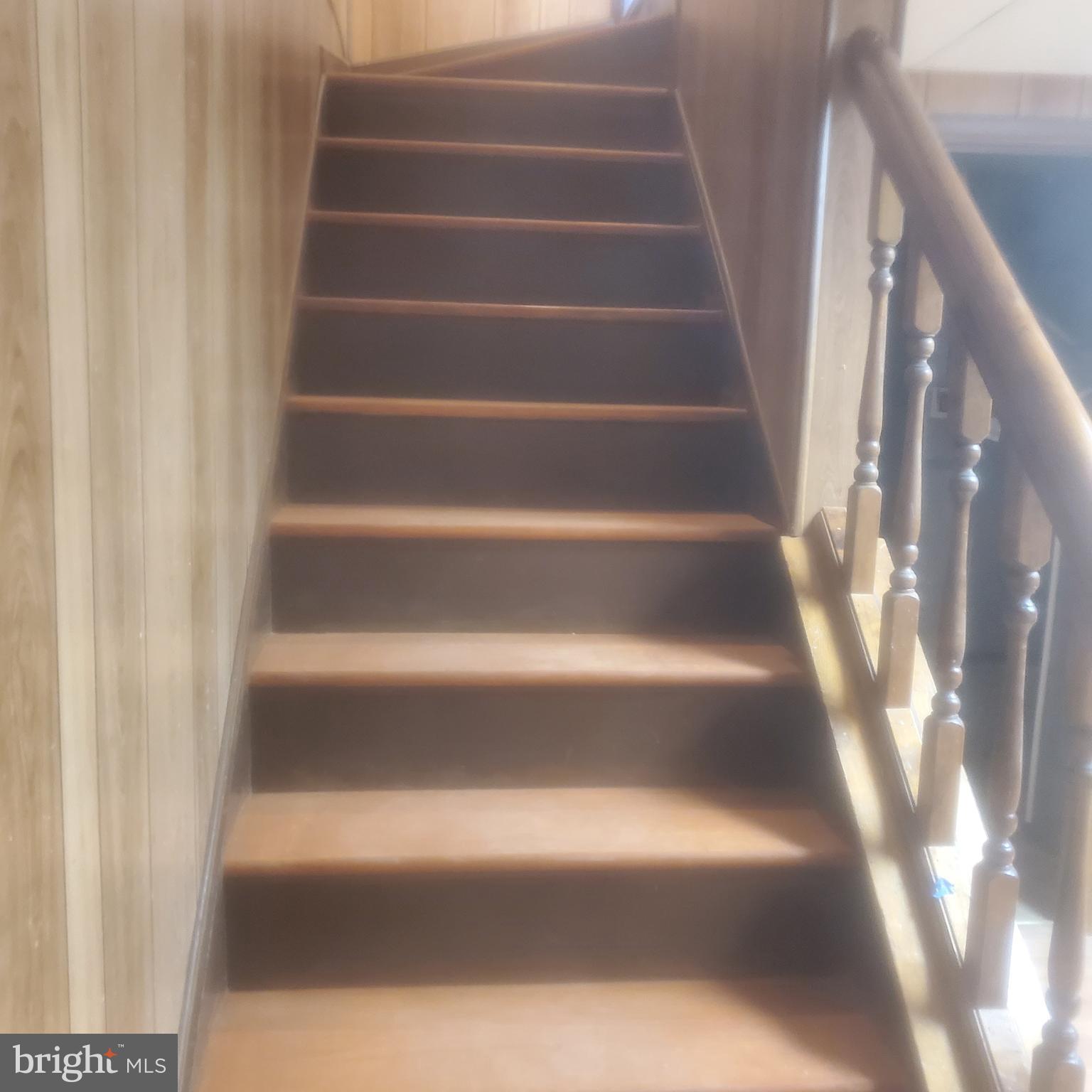 9202 Weathervane Place Montgomery Village, MD 20886 - Photo 25 of 71 a view of staircase with white walls
