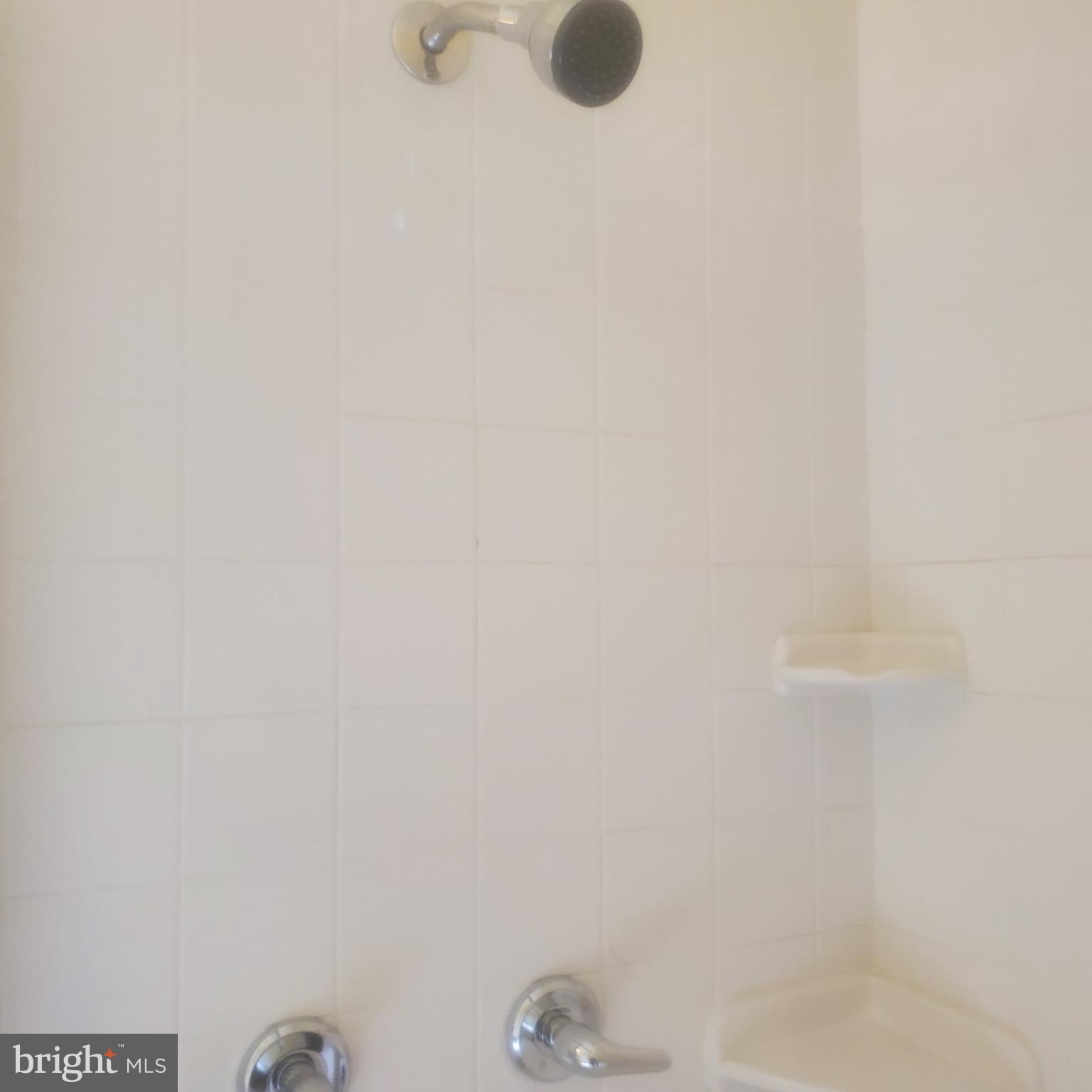 9202 Weathervane Place Montgomery Village, MD 20886 - Photo 31 of 71 a bathroom with a shower
