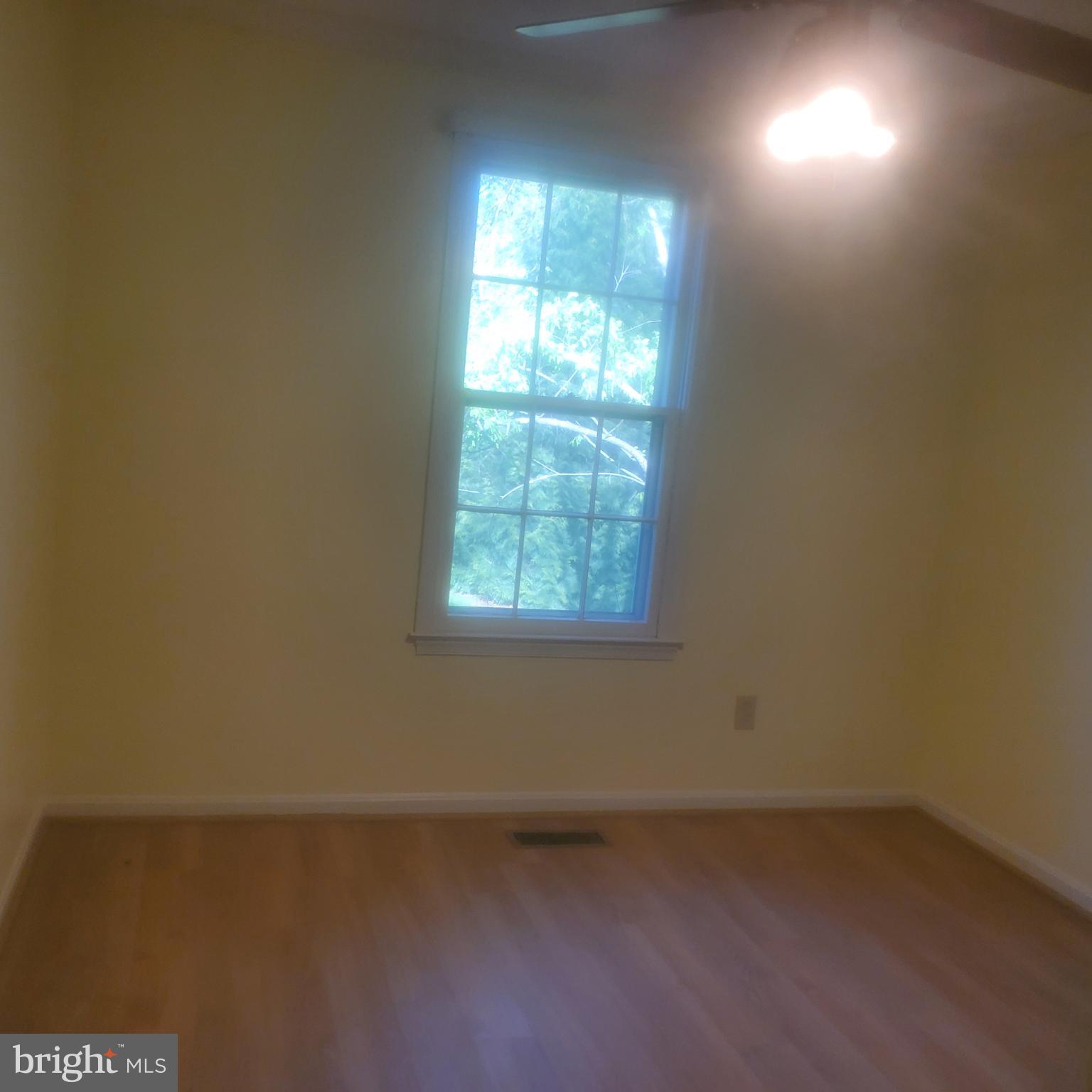 9202 Weathervane Place Montgomery Village, MD 20886 - Photo 37 of 71 an empty room with a window