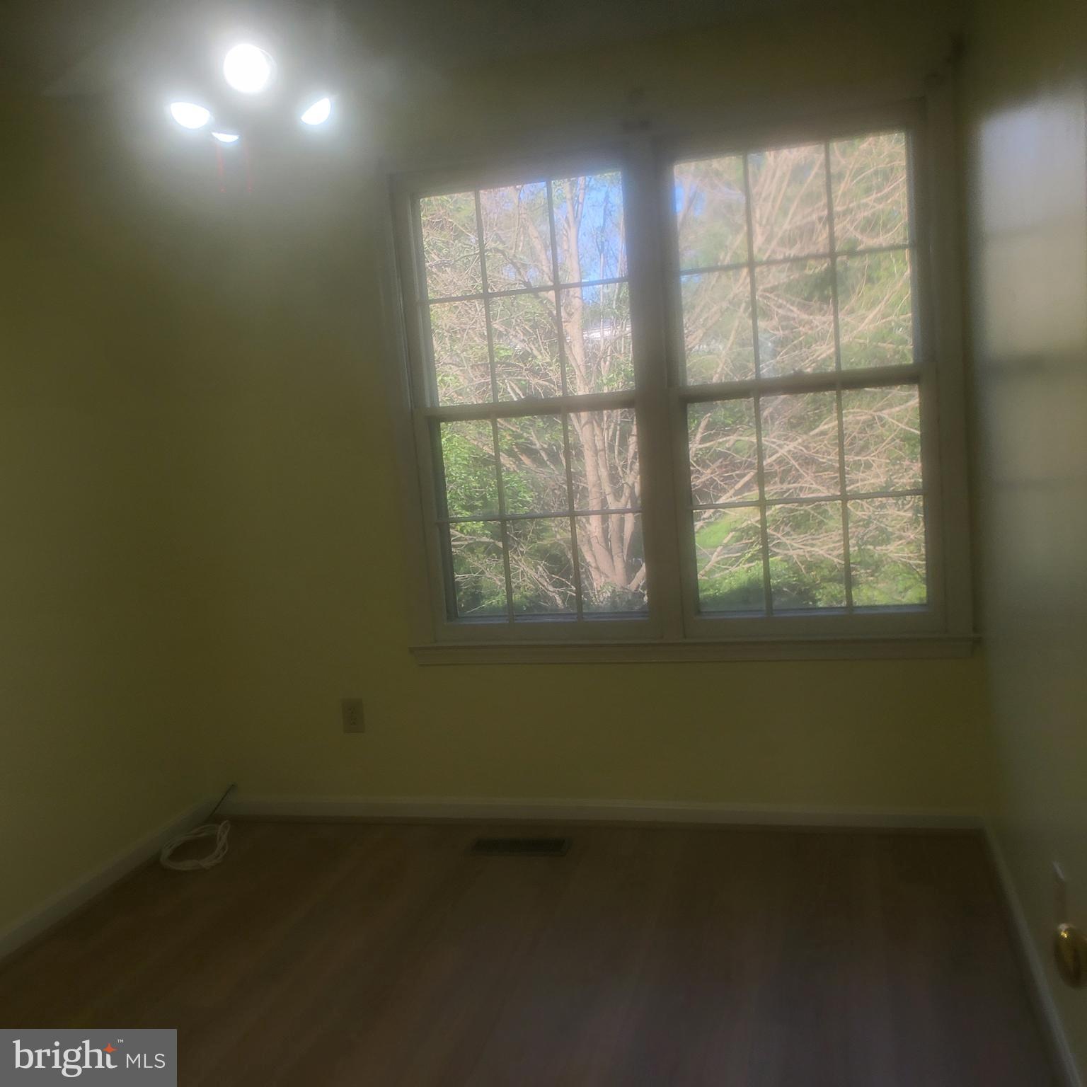 9202 Weathervane Place Montgomery Village, MD 20886 - Photo 40 of 71 an empty room with a window