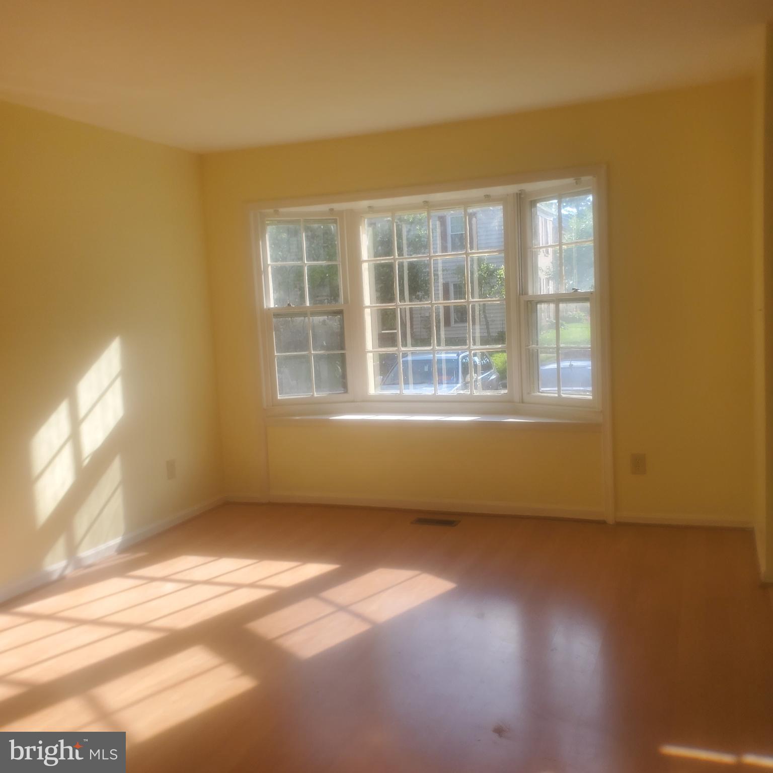 9202 Weathervane Place Montgomery Village, MD 20886 - Photo 42 of 71 a view of an empty room with a window