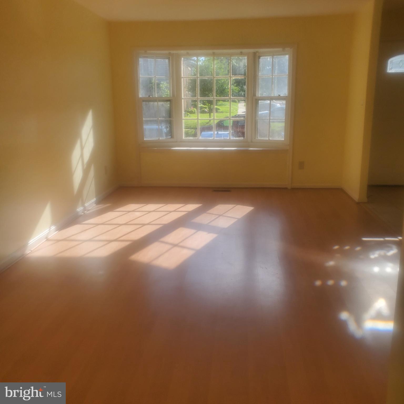 9202 Weathervane Place Montgomery Village, MD 20886 - Photo 43 of 71 a view of an empty room with a window
