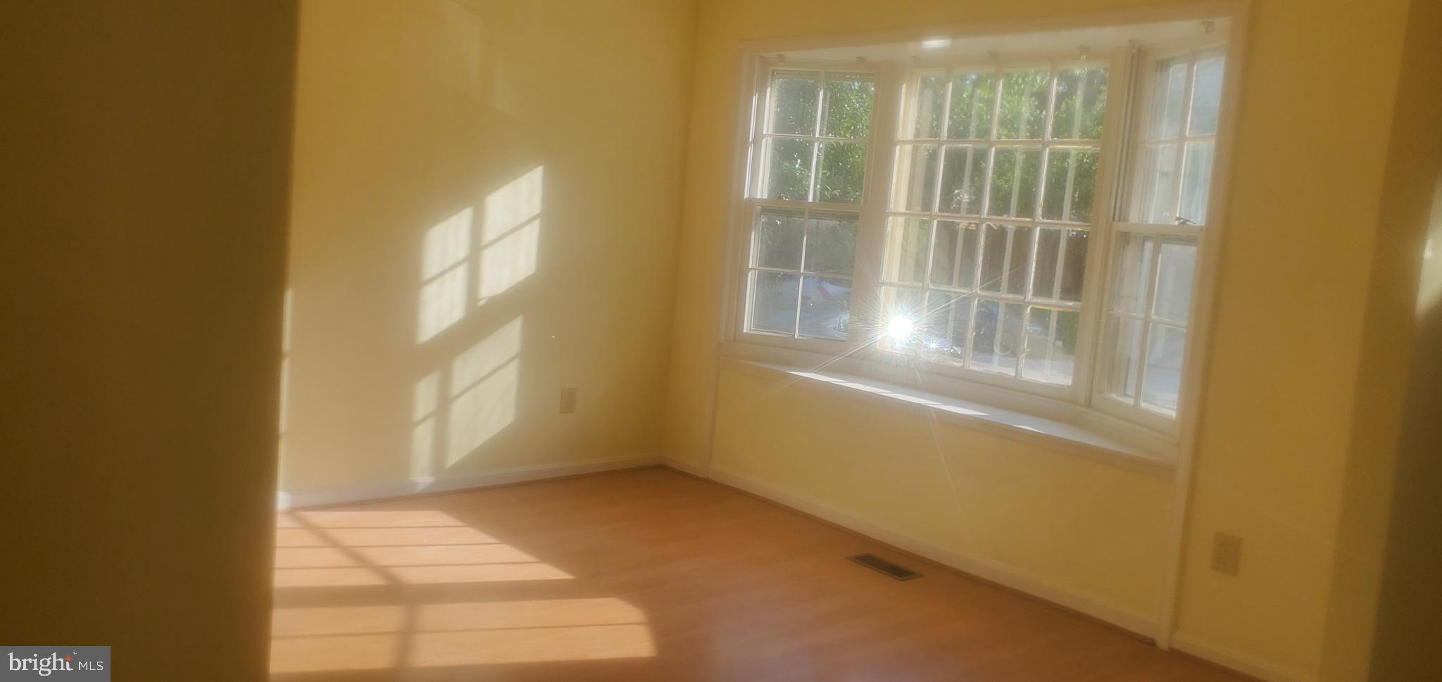 9202 Weathervane Place Montgomery Village, MD 20886 - Photo 52 of 71 a view of an empty room with a window