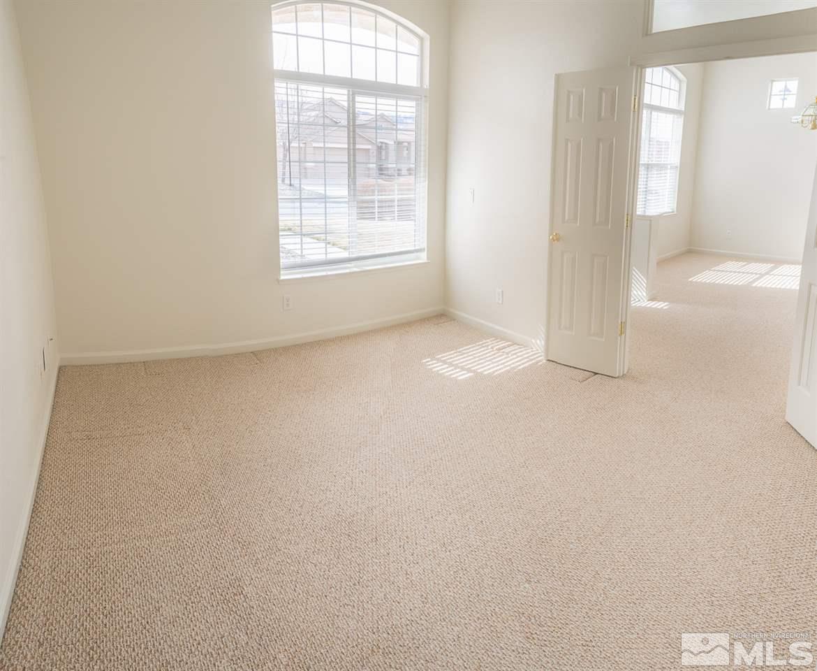 10490 Arbor Way Reno, NV 89521 - Photo 12 of 23 an empty room with windows