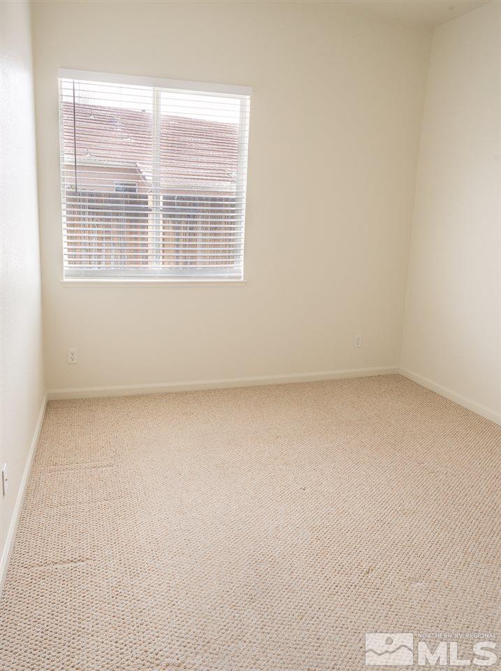 10490 Arbor Way Reno, NV 89521 - Photo 14 of 23 an empty room with a window