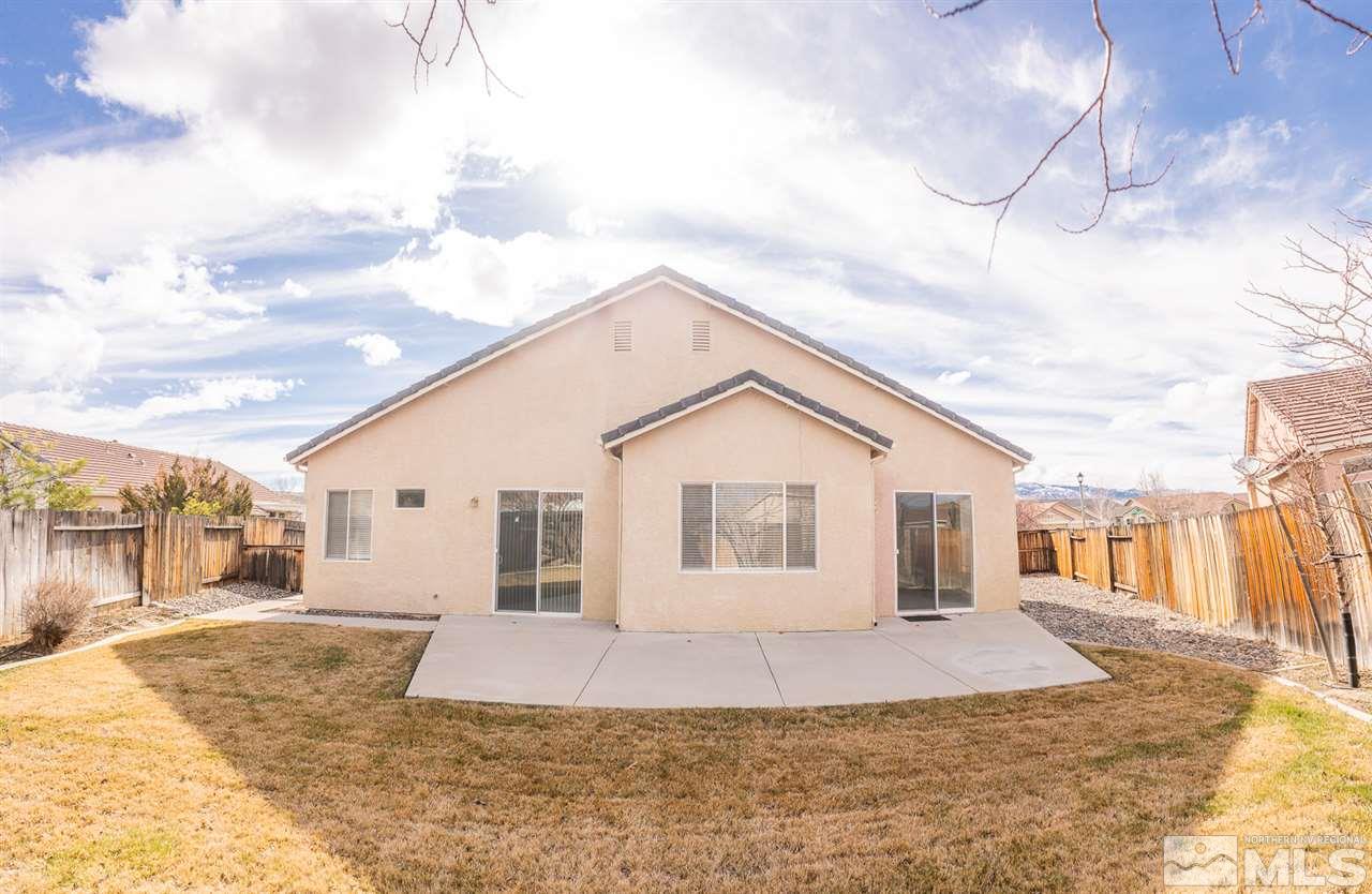 10490 Arbor Way Reno, NV 89521 - Photo 20 of 23 a view of a house with a yard