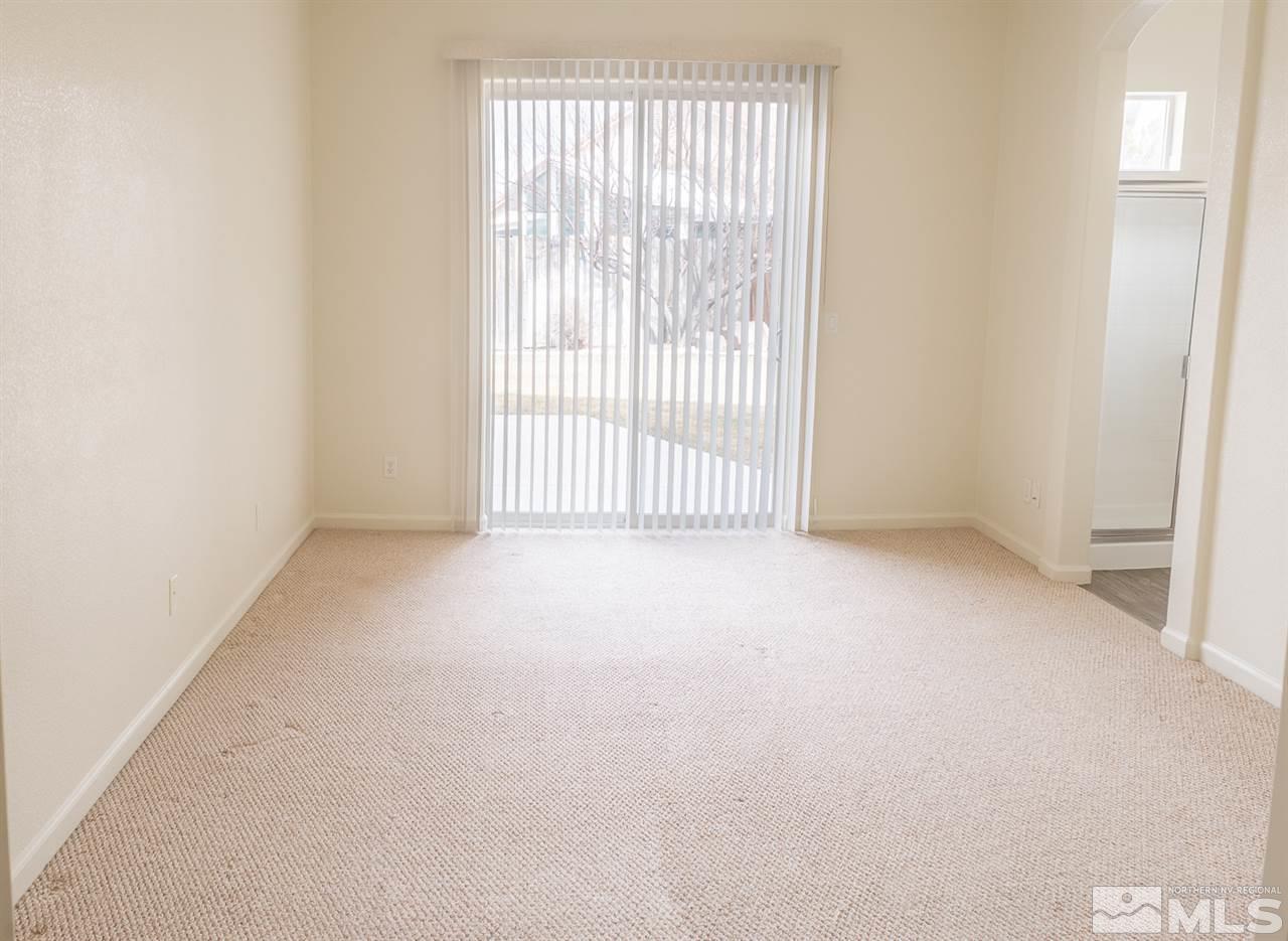 10490 Arbor Way Reno, NV 89521 - Photo 9 of 23 an empty room with windows