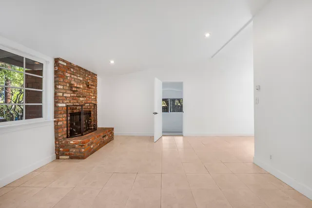 a view of livingroom with furniture and window