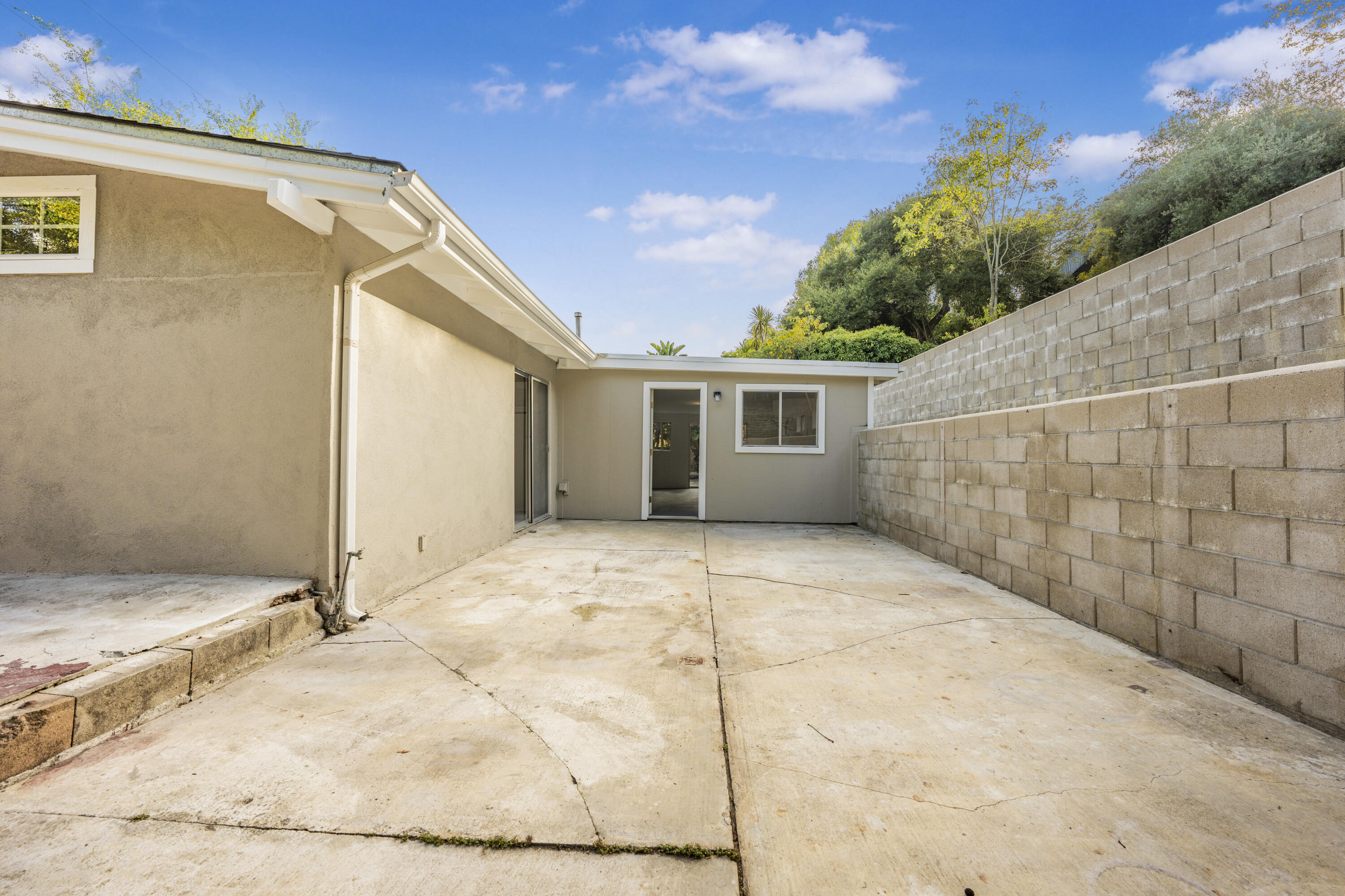 901 Fellowship Road Santa Barbara, CA 93109 - Photo 37 of 44 a view of house with backyard and trees in the background