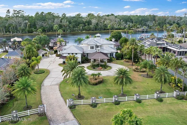 an aerial view of residential house with outdoor space