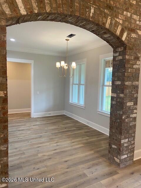 118 Grayson Way Madison, MS 39110 - Photo 6 of 35 brick arch to kitchen-keeping rm