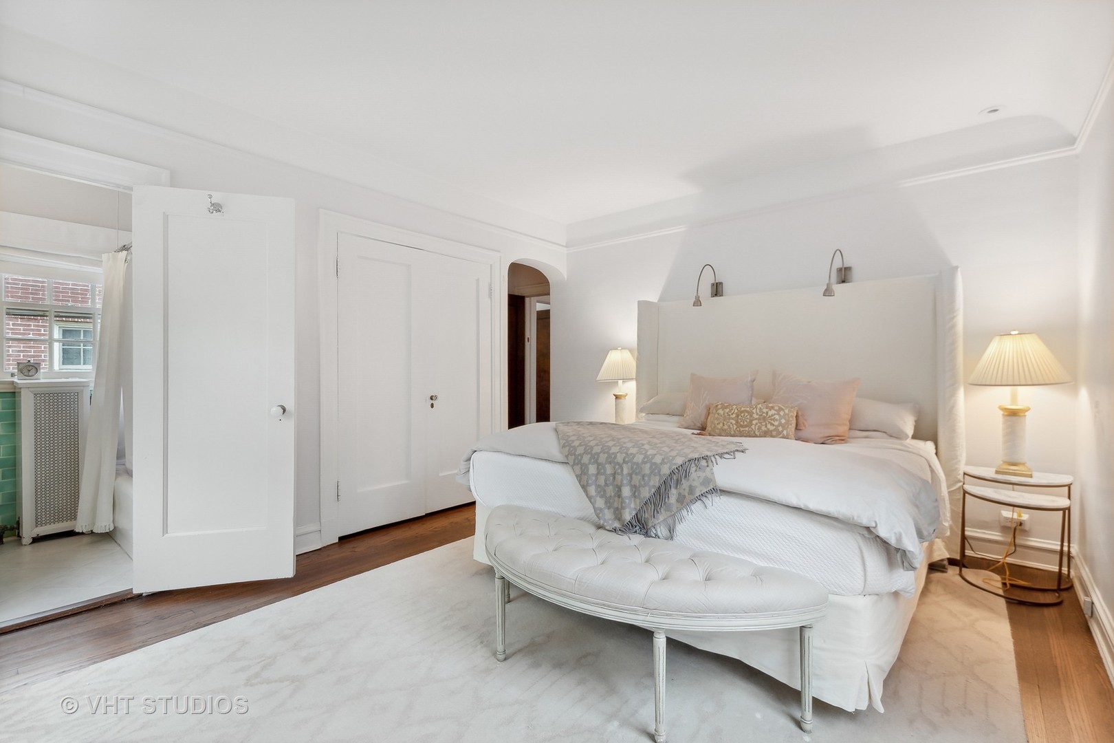 2744 Ridge Avenue Evanston, IL 60201 - Photo 14 of 33 a spacious bedroom with a bed and a table