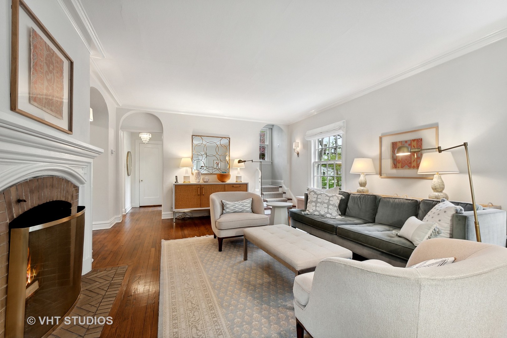 2744 Ridge Avenue Evanston, IL 60201 - Photo 2 of 33 a living room with furniture a fireplace and a window