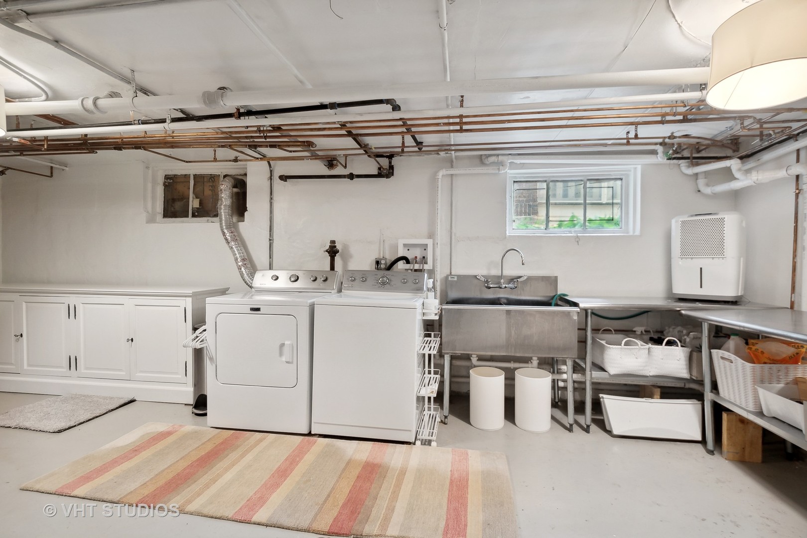 2744 Ridge Avenue Evanston, IL 60201 - Photo 23 of 33 a utility room with cabinets
