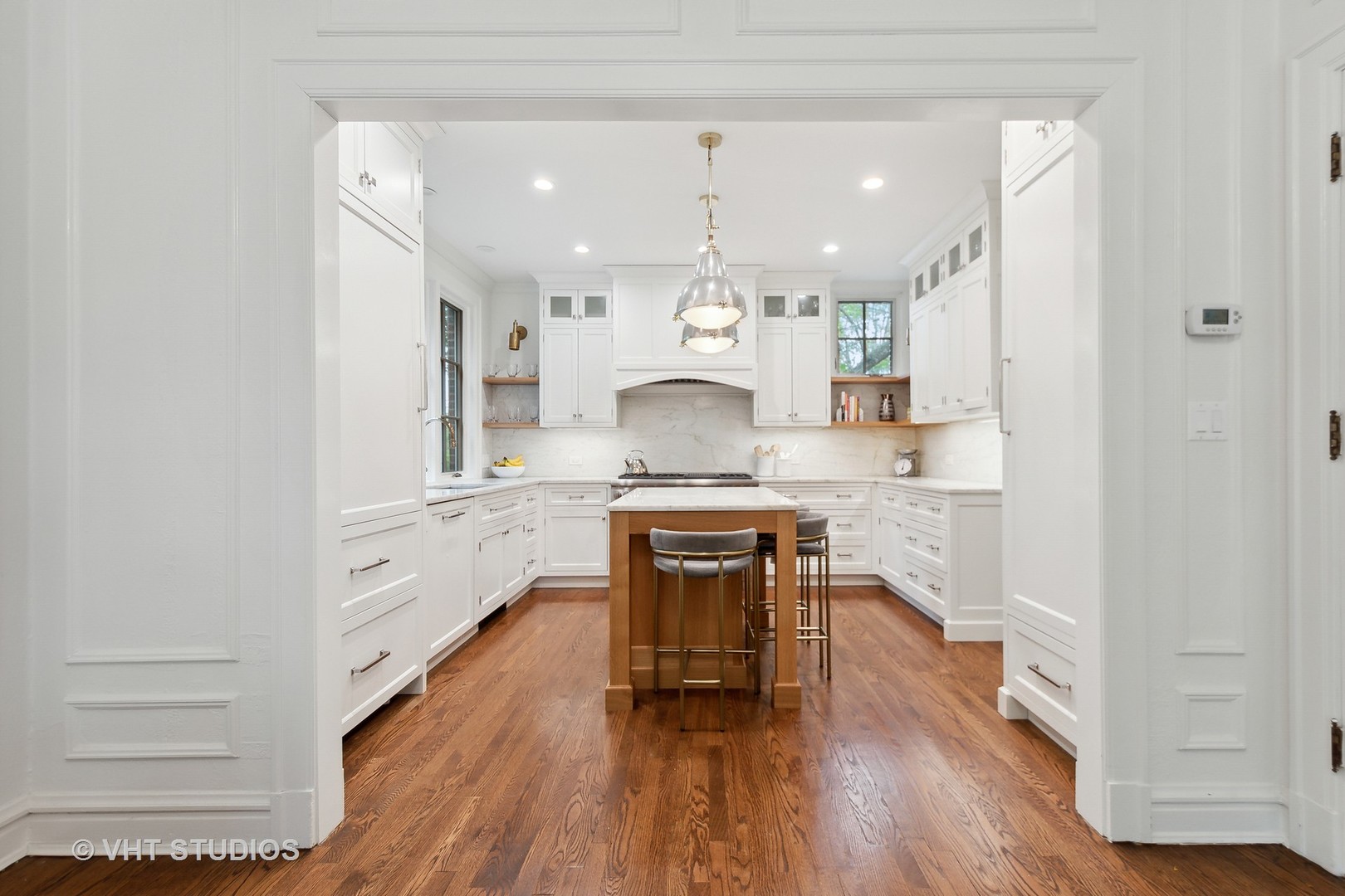 2744 Ridge Avenue Evanston, IL 60201 - Photo 6 of 33 a kitchen with granite countertop white cabinets and white appliances
