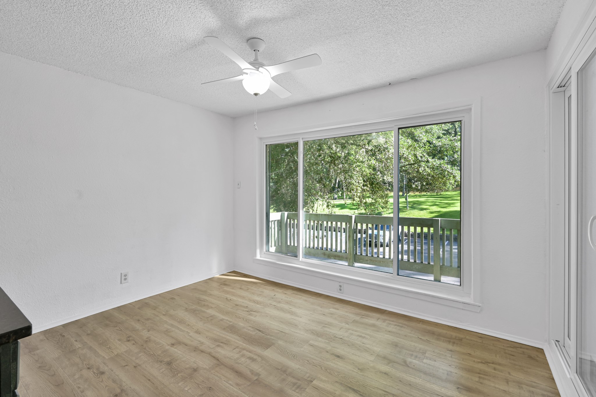 162 Villa Way Coldspring, TX 77331 - Photo 12 of 42 a view of an empty room with a window