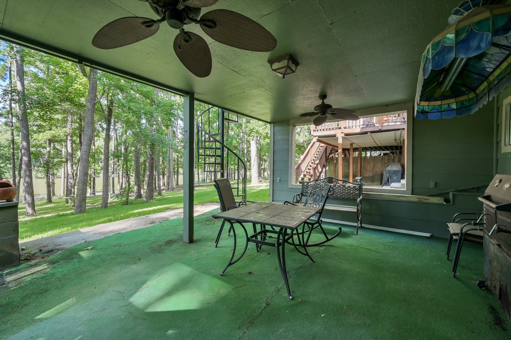 162 Villa Way Coldspring, TX 77331 - Photo 25 of 42 a view of a house with backyard porch and sitting area