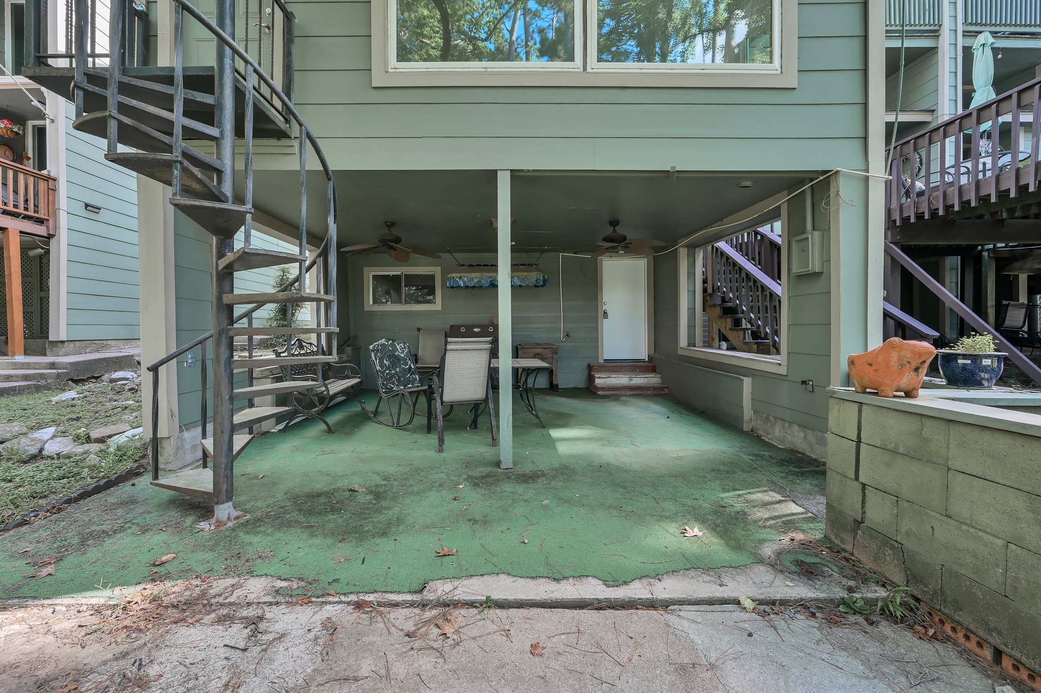 162 Villa Way Coldspring, TX 77331 - Photo 26 of 42 a backyard of a house with outdoor seating