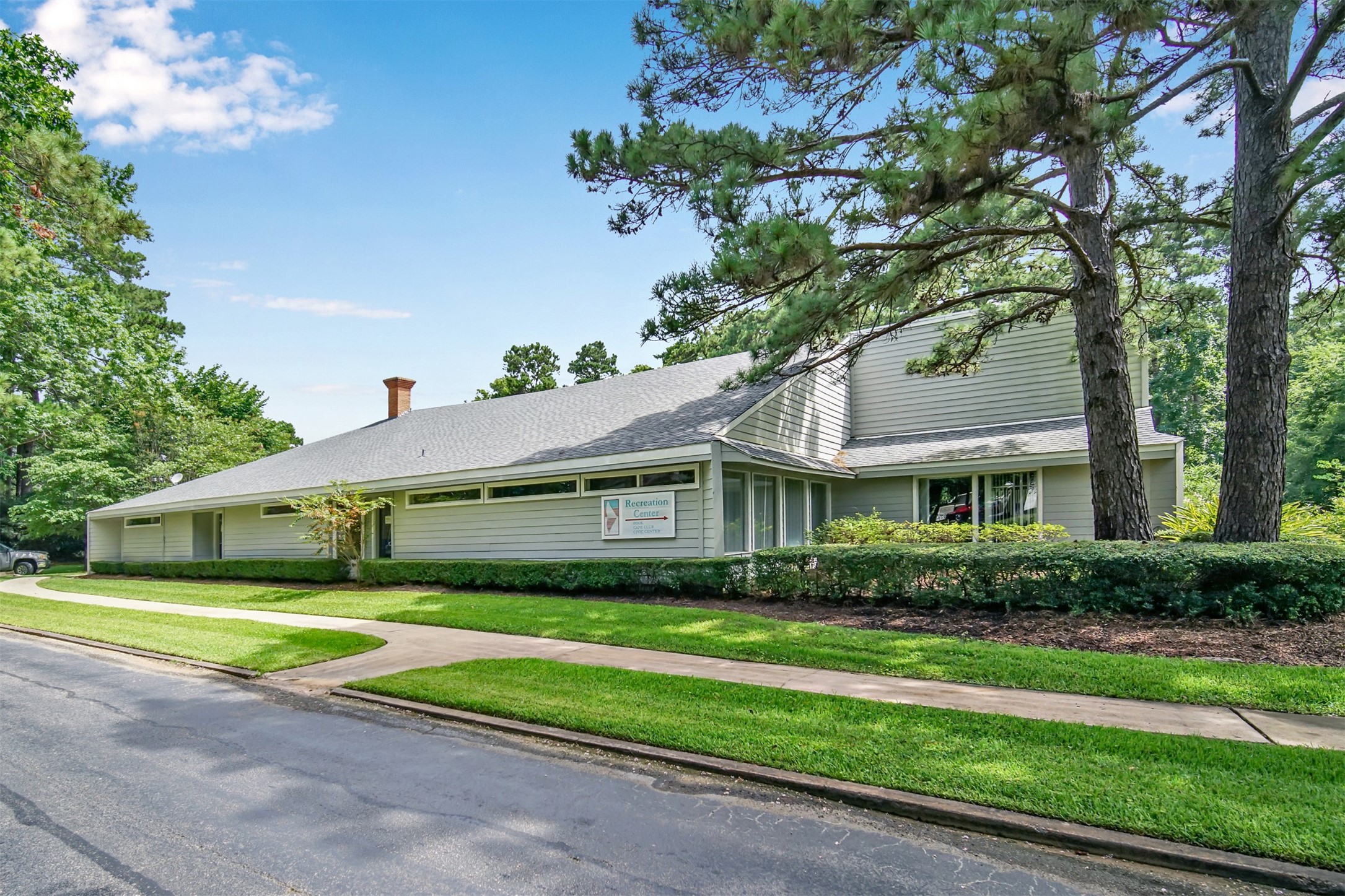 162 Villa Way Coldspring, TX 77331 - Photo 30 of 42 a front view of a house with a garden and plants