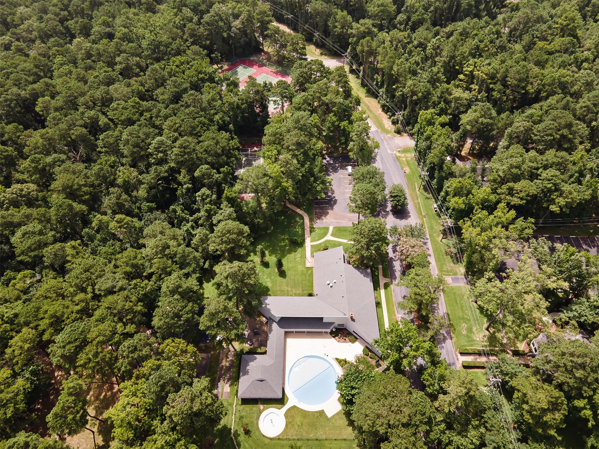 162 Villa Way Coldspring, TX 77331 - Photo 33 of 42 an aerial view of residential house with outdoor space and trees all around