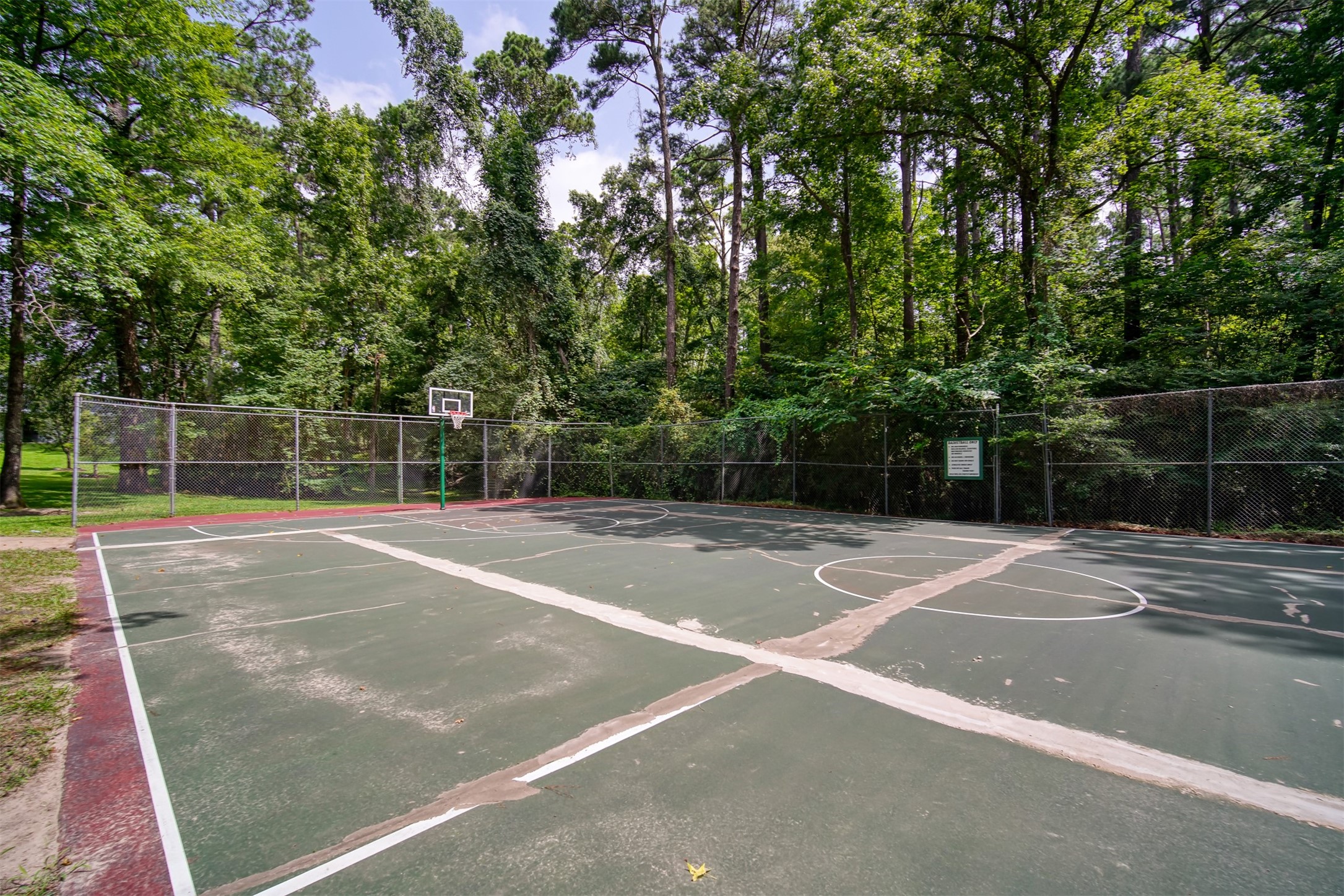 162 Villa Way Coldspring, TX 77331 - Photo 36 of 42 a view of a tennis court