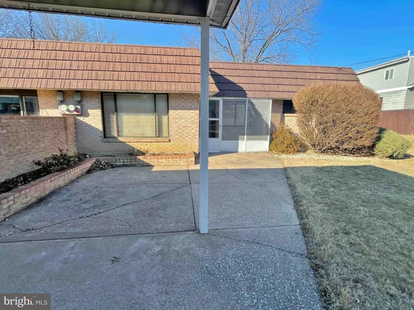 a front view of a house with a garage