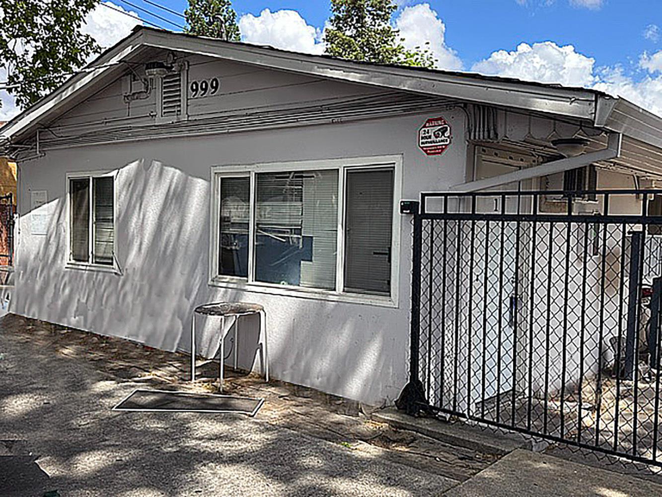 a front view of a house with a garage